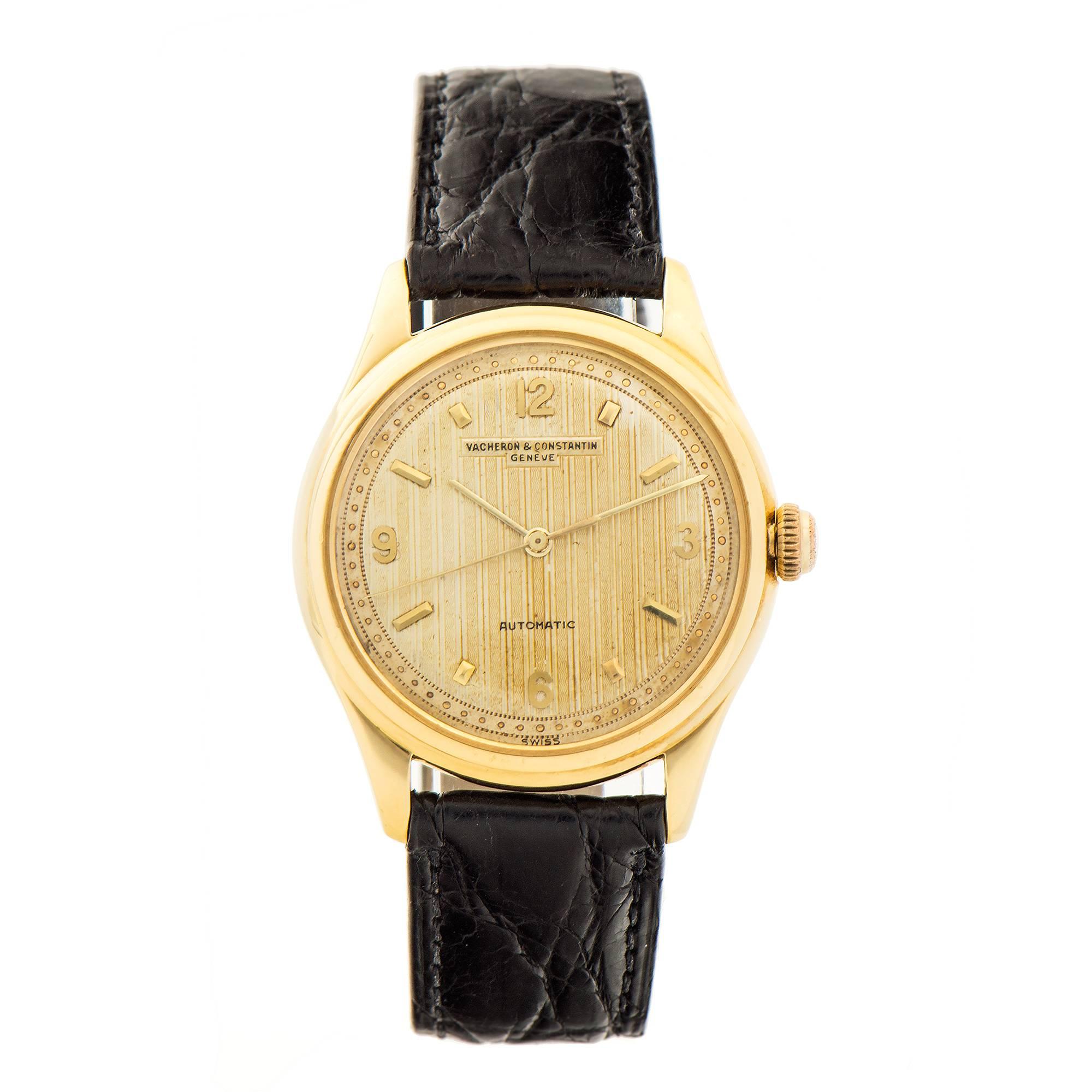 Authentic all original Vacheron Constantin genuine automatic wrist watch with factory original gold tone. Highly detailed pin stripe dial. 1960

18k yellow gold
45.5 grams
Length: 42.19mm
Width: 35mm
Band width at case: 18mm
Case thickness: