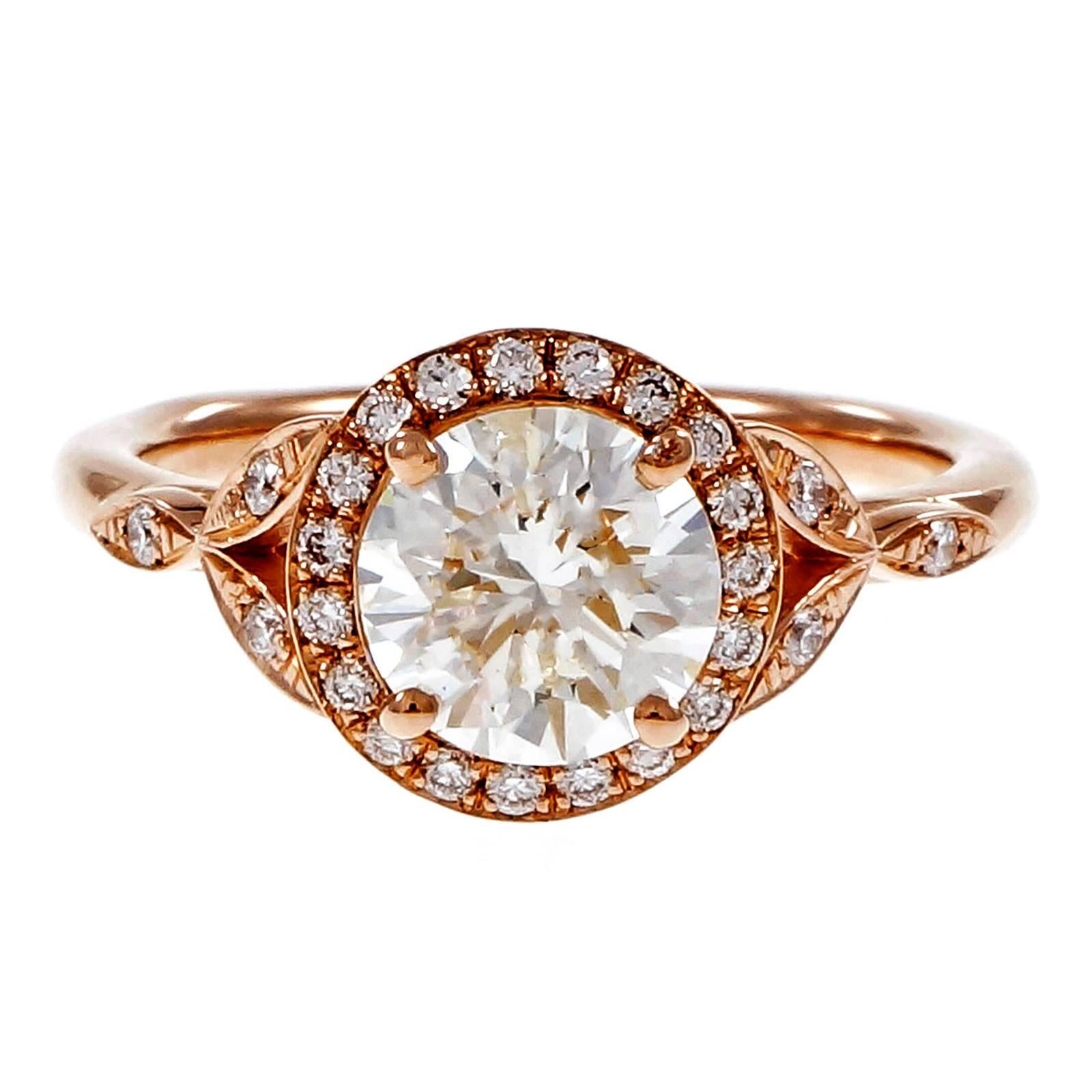 Peter Suchy 14k rose gold round halo engagement ring with antique style sides designed to fit flush with a wedding band. GIA certified. 

1 round diamond, approx. total weight 1.37cts, J, SI2, GIA certificate #1162654836
25 round full cut diamonds,