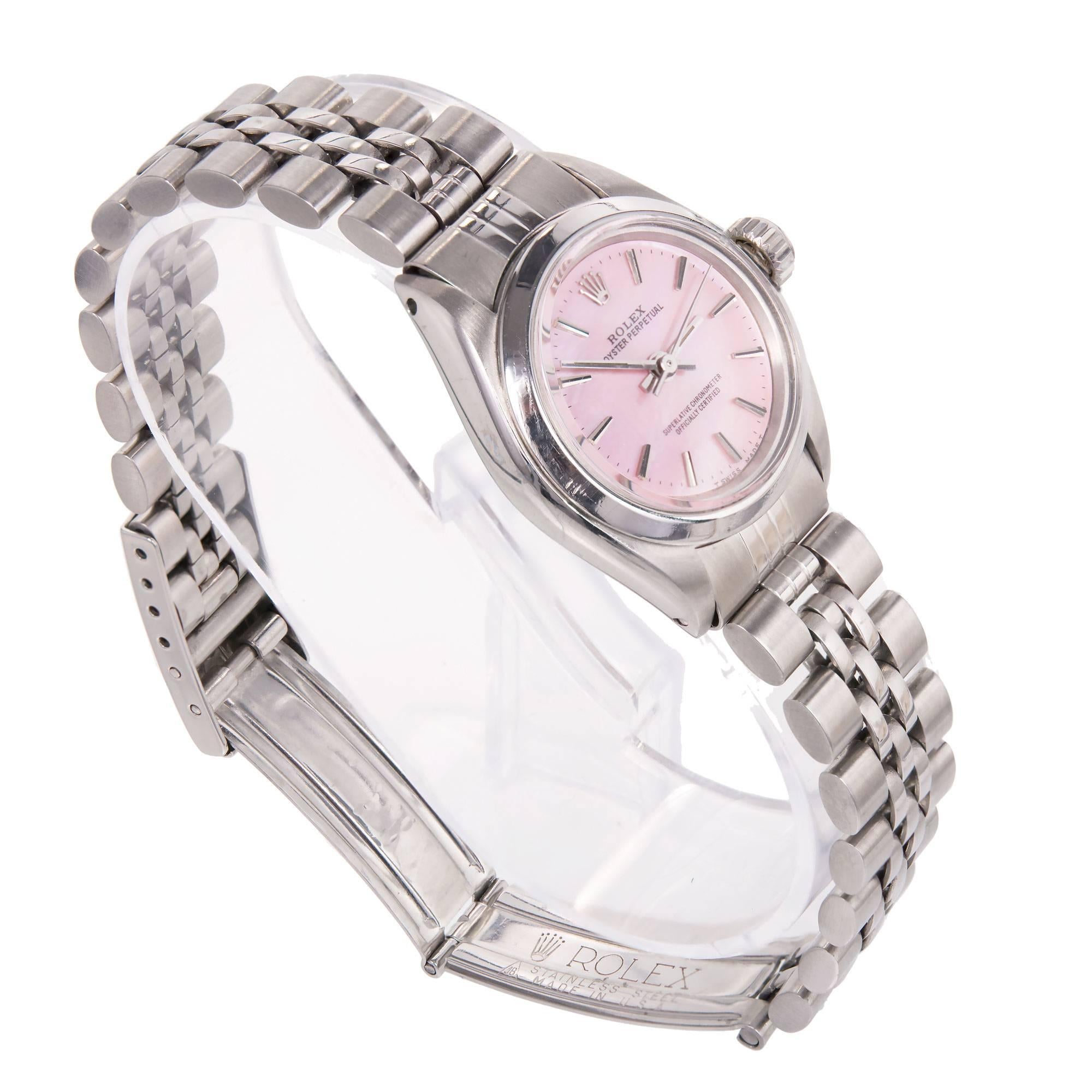 Rolex lady's stainless steel Oyster Perpetual wristwatch with redone custom pink mother-of-pearl dial not original to watch. Ref. 6718, circa 1977. Plain bezel, Rolex Jubilee bracelet, after-market sapphire crystal.

Stainless steel
Length:6.75