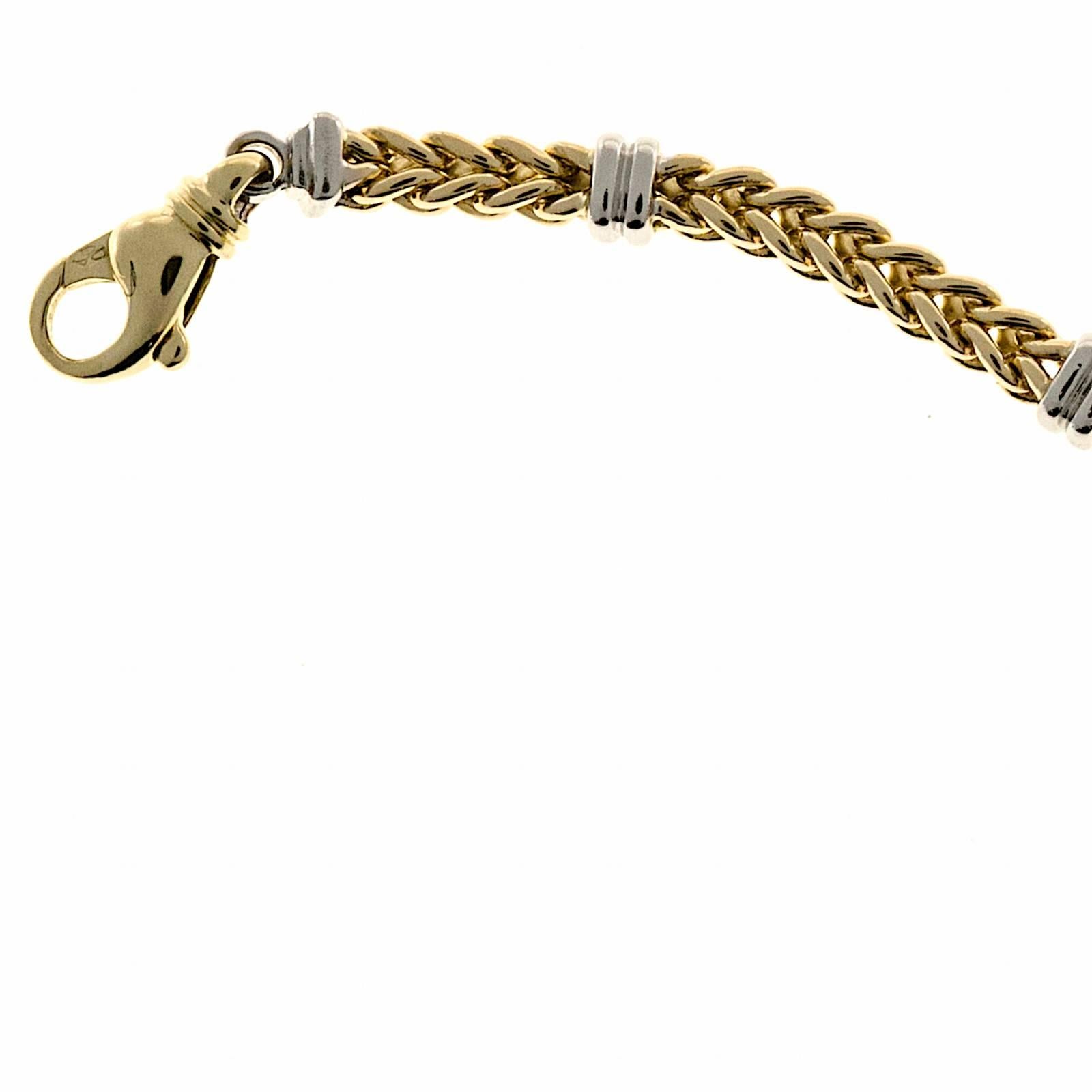Italian made heavy solid yellow gold bracelet with white bars made by DAG. Circa 1970

14k Yellow and white gold
Length: 7.5 Inches
Bars: 6.62mm or .26 inch
Chain: 4.86mm or .12 inch
Depth: 4.21mm
27.2 grams
Tested: 14k
Stamped: 14k Italy
Hallmark: