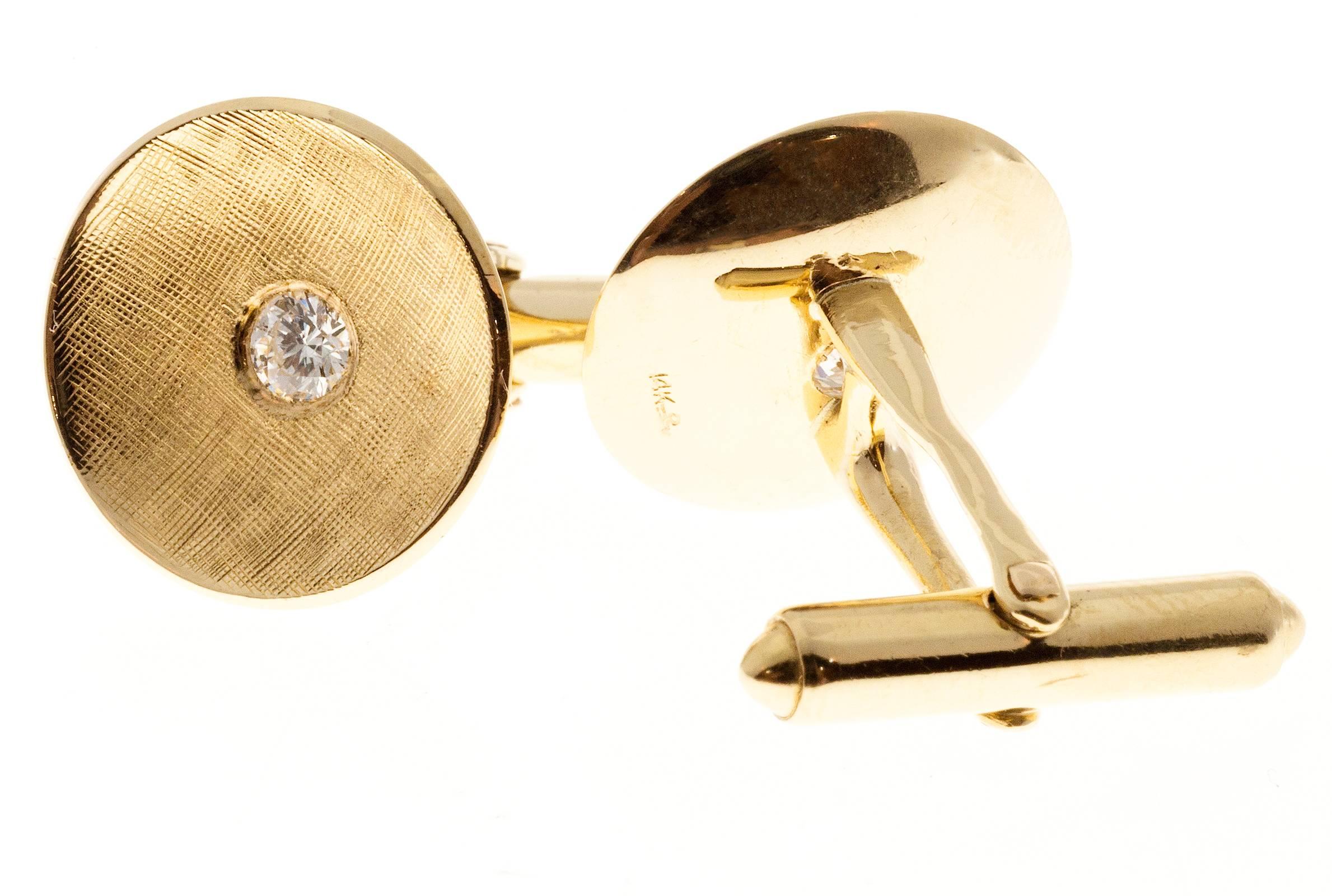Larter & Sons Diamond Round Concave Gold Cufflinks. Circa 1940’s 

2 round diamonds approx. total weight .40cts, G, VS2
14k Yellow Gold
Stamped Larter & Sons 14k
10.0 grams
Diameter:  11/16 inch
