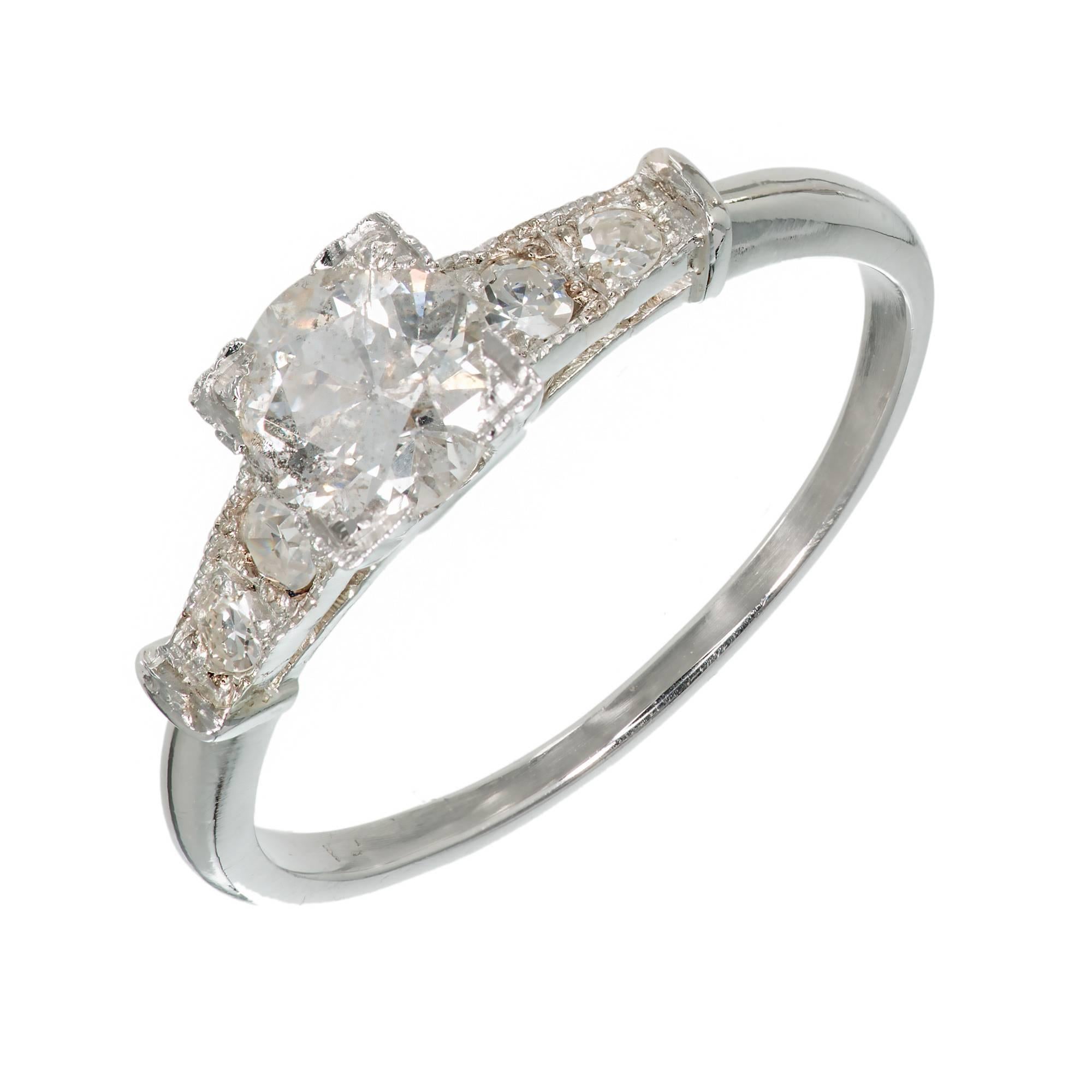  Art Deco circa 1930-1939 natural faint gray diamond platinum engagement ring with a hint of pink overtone. Original 1940's Art Deco mounting.

1 GIA certified round diamond .73cts, 5.71 x 5.81 x 3.58mm natural faint gray transitional cut SI2