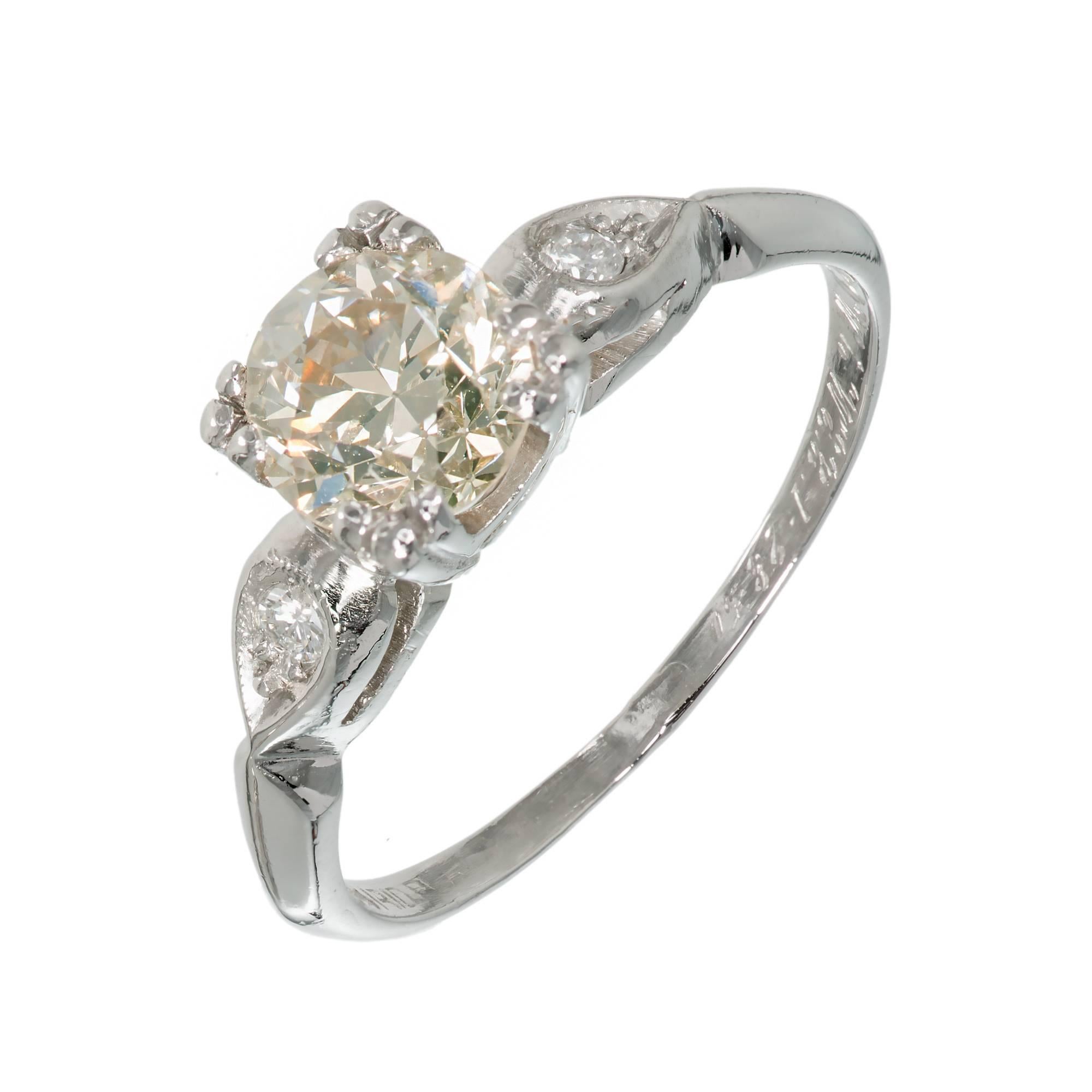 European cut original Art Deco 1920-1929  handmade Platinum diamond three-stone engagement ring.

1 GIA certified #2125984880 diamond, approx. total weight .93cts. O to P color range, VS2 clarity late European cut
2 full cut diamonds, approx. total