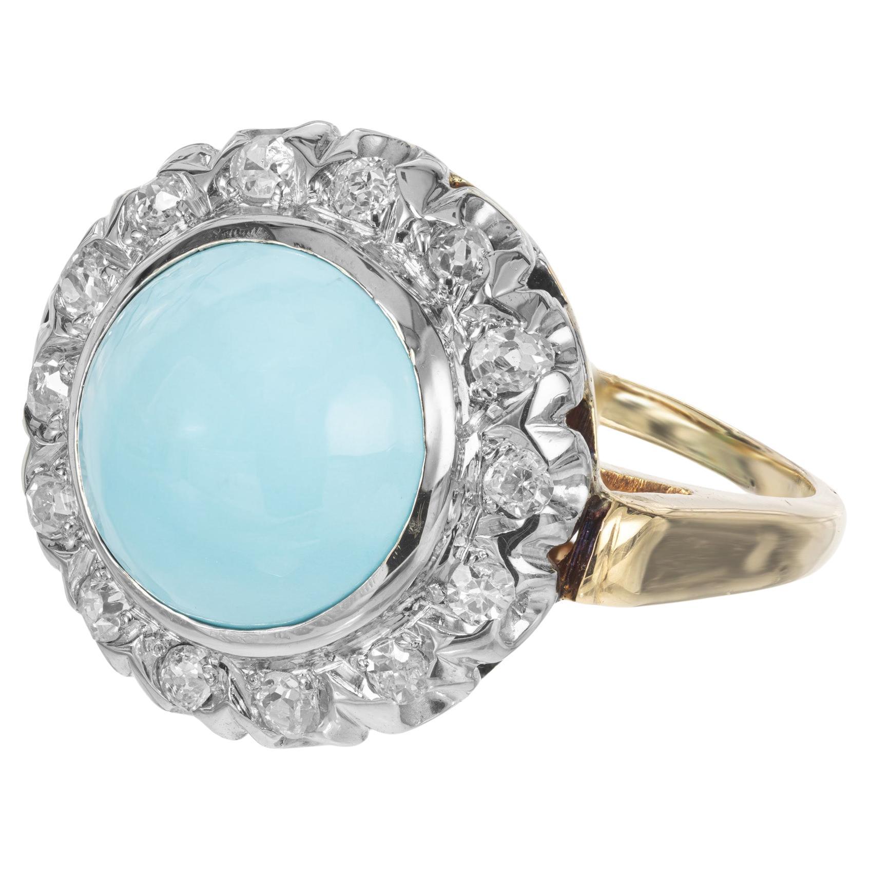 Bague cocktail en or avec turquoise cabochon de Perse certifiée GIA et halo de diamants