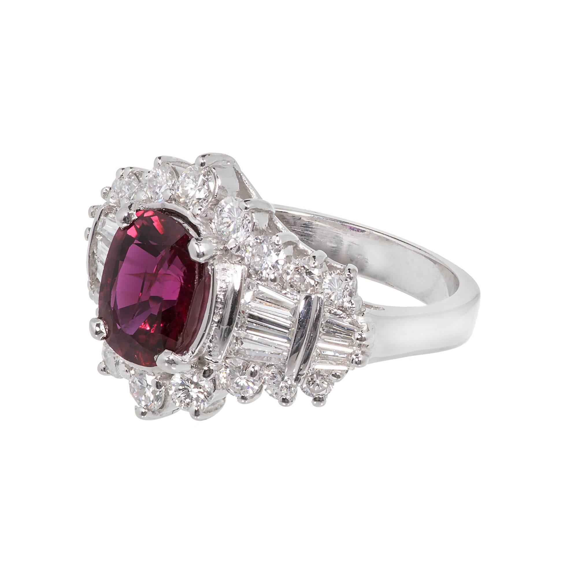 Vintage 1960 top gem red Ruby and diamond ring. In a platinum setting.  GIA certified heated with minor residue only. Fine bright baguette and round diamonds.

1 oval gem red Ruby, approx. total weight 2.30cts, heated, simple heat only, minor
