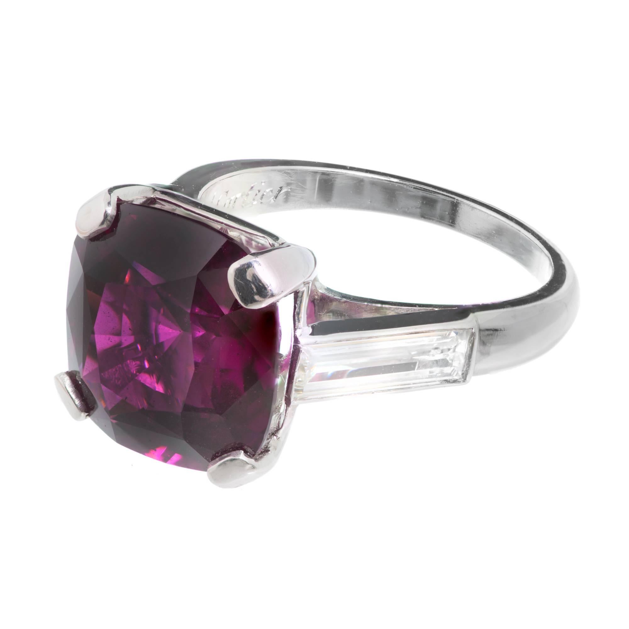 Cartier Platinum ring circa 1940 with Cartier straight baguette diamonds. The center is set with a pink purple Pyrope Almandine cushion cut Garnet, 7.85cts of excellent cut and brilliance that shows a hint of color change in different lights. The