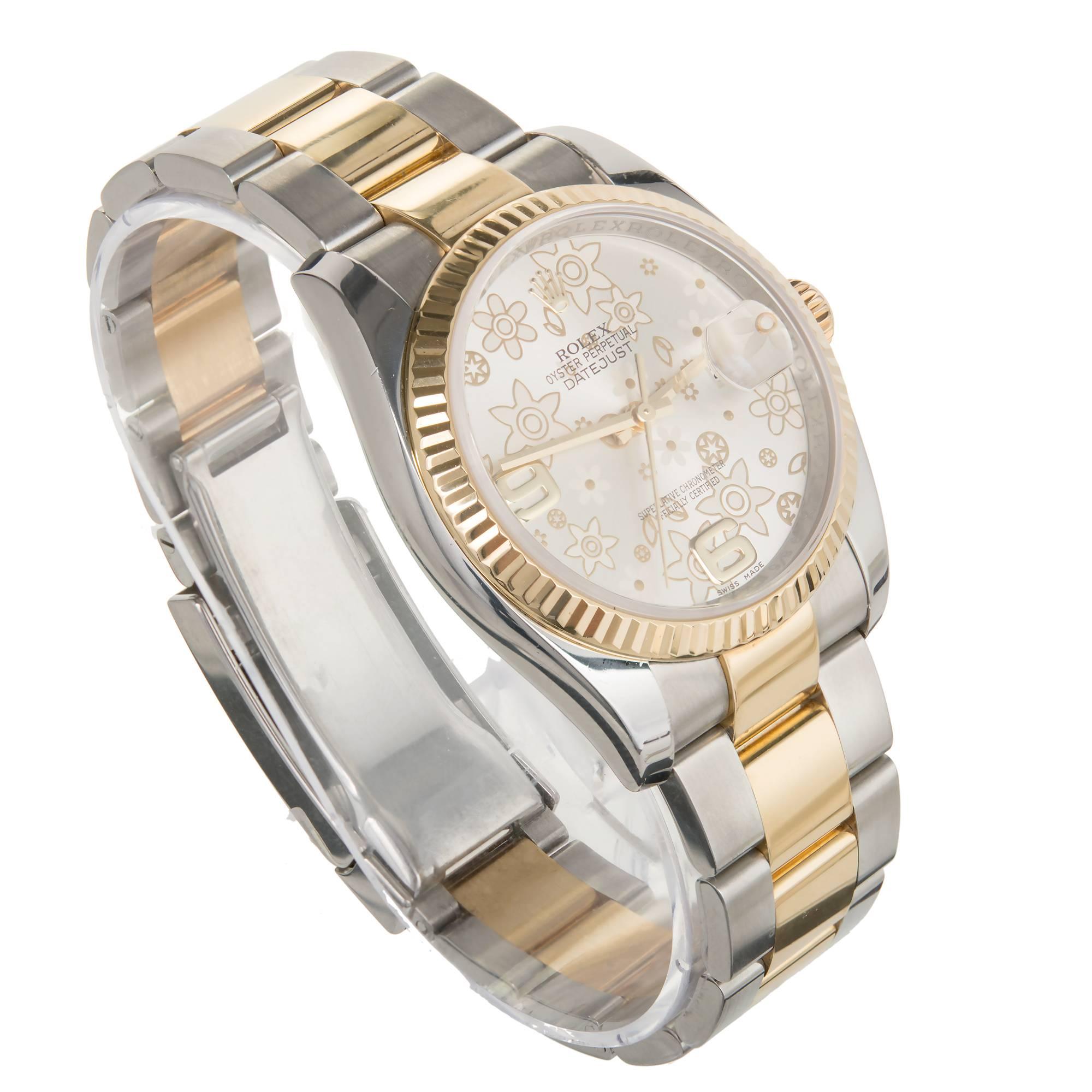 Rolex lady's stainless steel and 18k yellow gold wristwatch, Ref. 116233, with flower dial, Oyster bracelet with new-style adjustable band. Complete with box. Circa 2013.

Stainless Steel and 18k yellow gold 
Movement: Automatic 3135 3 3048437