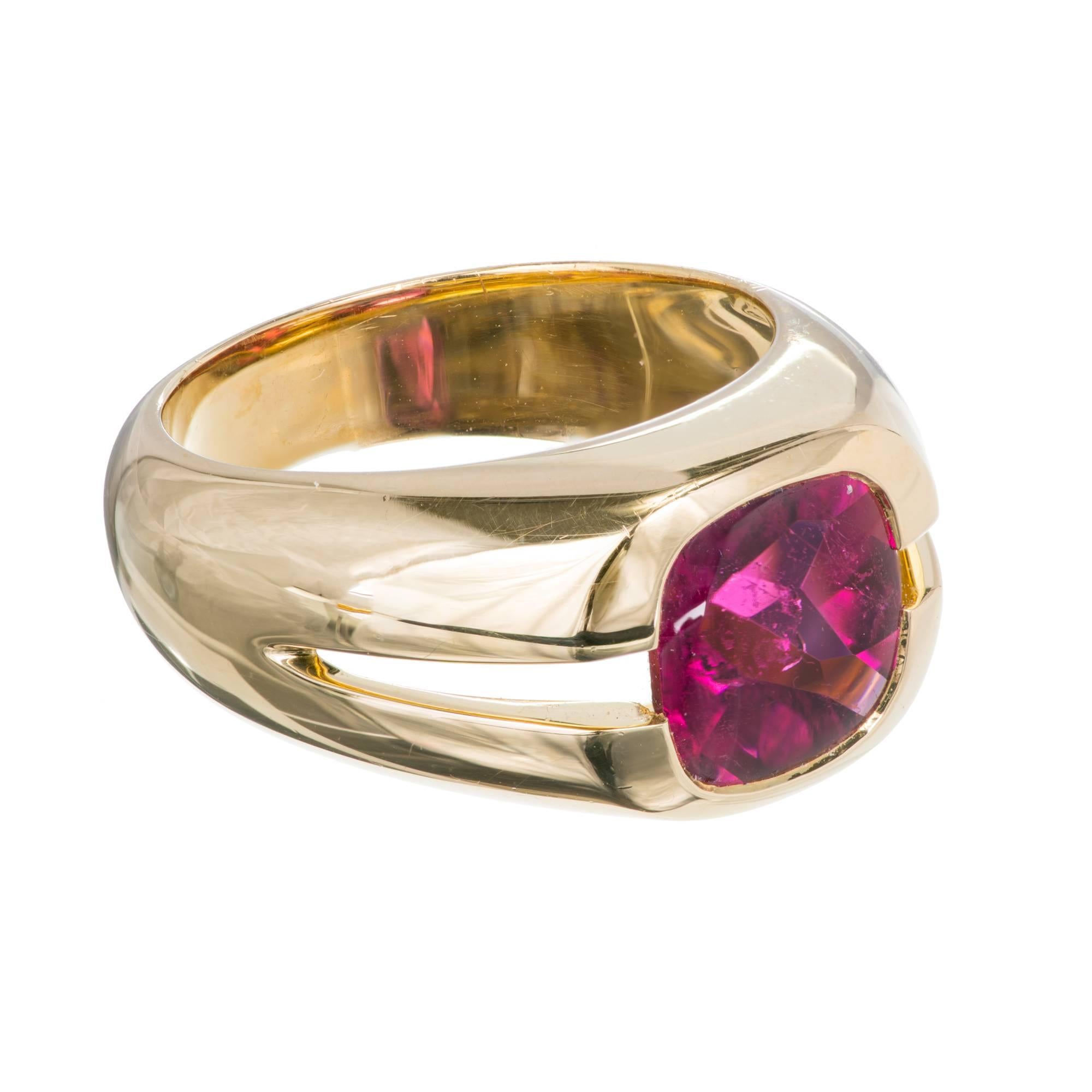 Tiffany & Co. 18k yellow gold ring with bright pink cushion tourmaline.

1 cushion pink tourmaline, approx. total weight 1.50cts, 7.91 x 7.84 x 5.22mm
18k yellow gold
Tested: 18k
Stamped: 750
Hallmark: © 2000 Tiffany & Co
10.1 grams
Width at top: