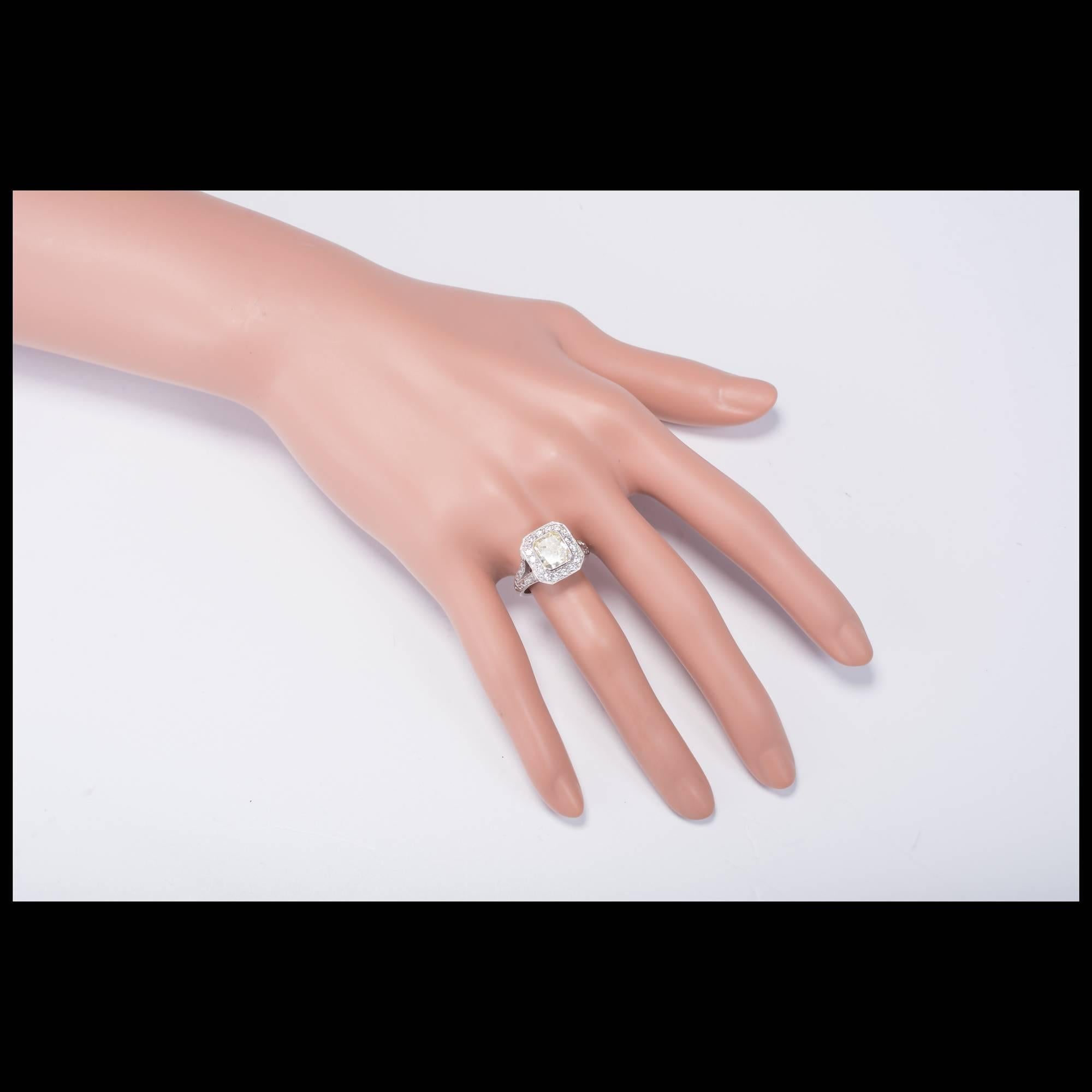 Women's Peter Suchy EGL 2.06 Carat Fancy Yellow Diamond Halo Platinum Engagement Ring For Sale