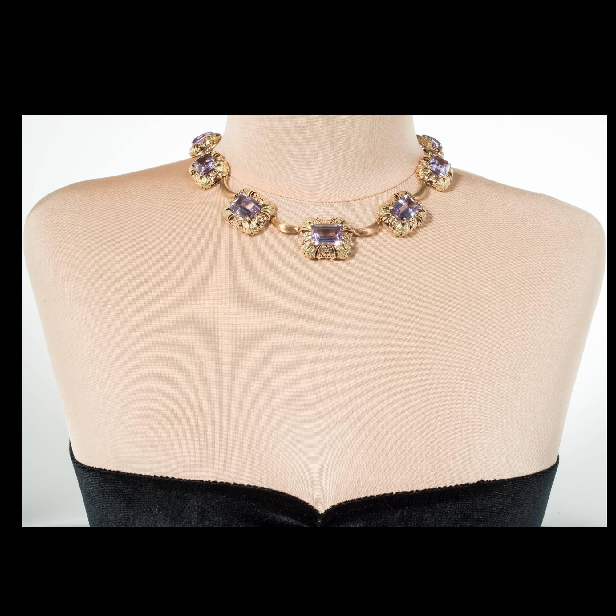 Handmade amethyst rose and green gold 10 section necklace. Hand formed and engraved flower motif 3-D sections connected by curved bars. Set with 10 genuine Emerald cut Amethyst GIA certified as natural, the GIA certificate refers to Amethyst today