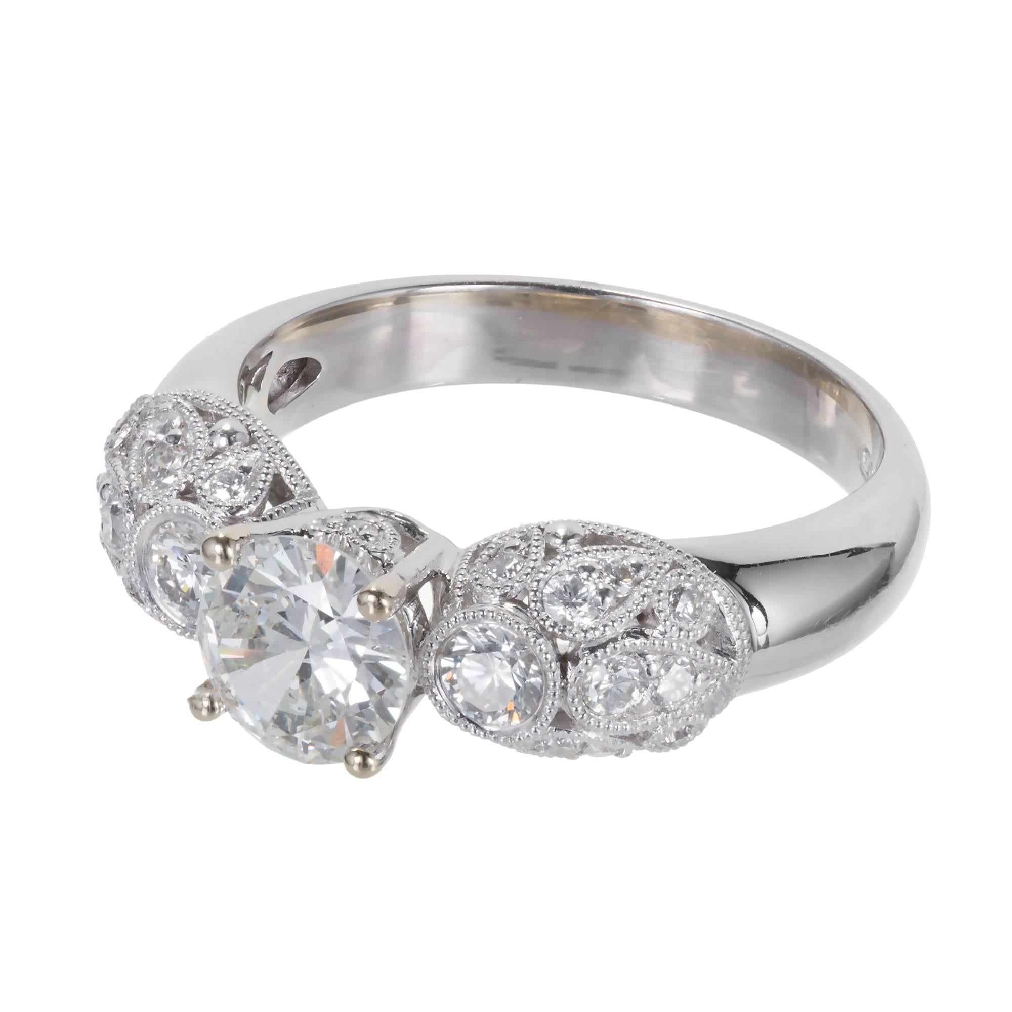 Sparkly transitional cut diamond engagement ring. .81ct diamond in a white gold domed and bead set setting.

18k White gold
 1 transitional round brilliant cut diamond, approx. total weight .81cts, I, SI2, 6.31 x 6.38 x 3.18mm, Depth: 50.1%  Table: