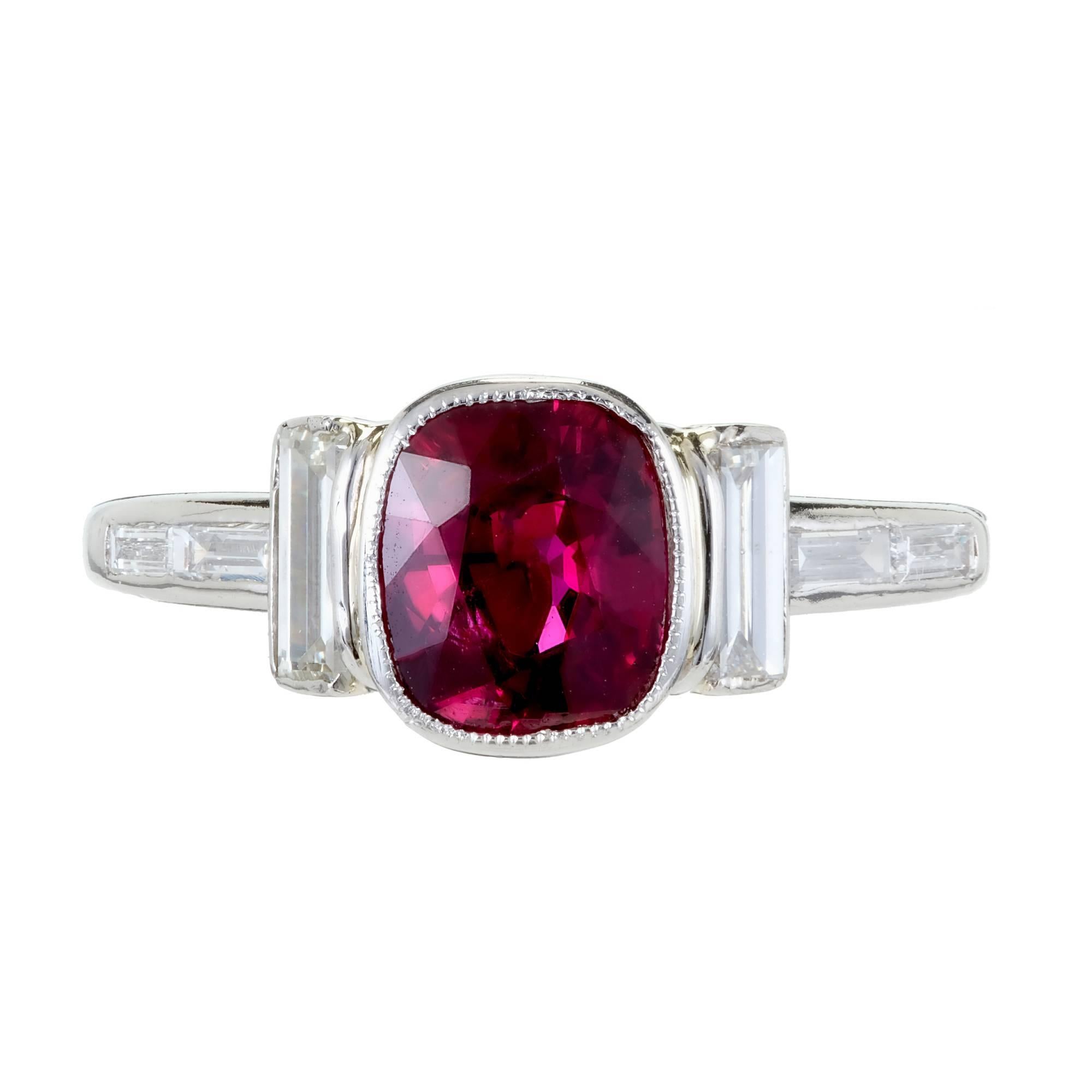 Art Deco cushion cut Ruby and white diamond engagement ring, with baguette accents in a platinum setting. GIA certified. 

1 antique cushion cut gem red Ruby, approx. total weight 1.66cts, SI, 7.50 x 6.12 x 4.18mm, GIA certificate #2165056540
6