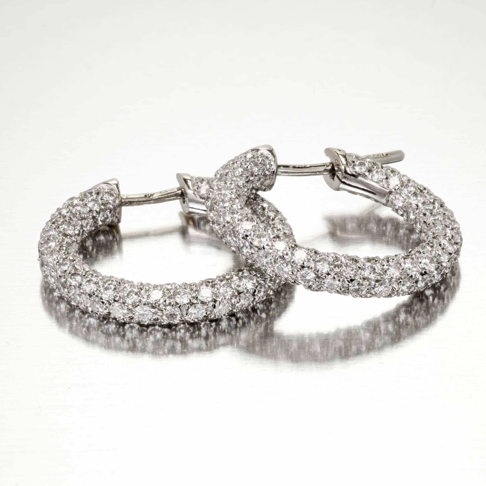 Diamond hoop earrings set with pave diamonds in 18k white gold. 

300 full cut diamonds, approximate total weight 2.50cts, F, VS2
8.3 grams
Diameter: .86 inch or 22mm (top to bottom and side to side)
3D round 3.5 to 3.4mm
Stamped: 18k Italy 750