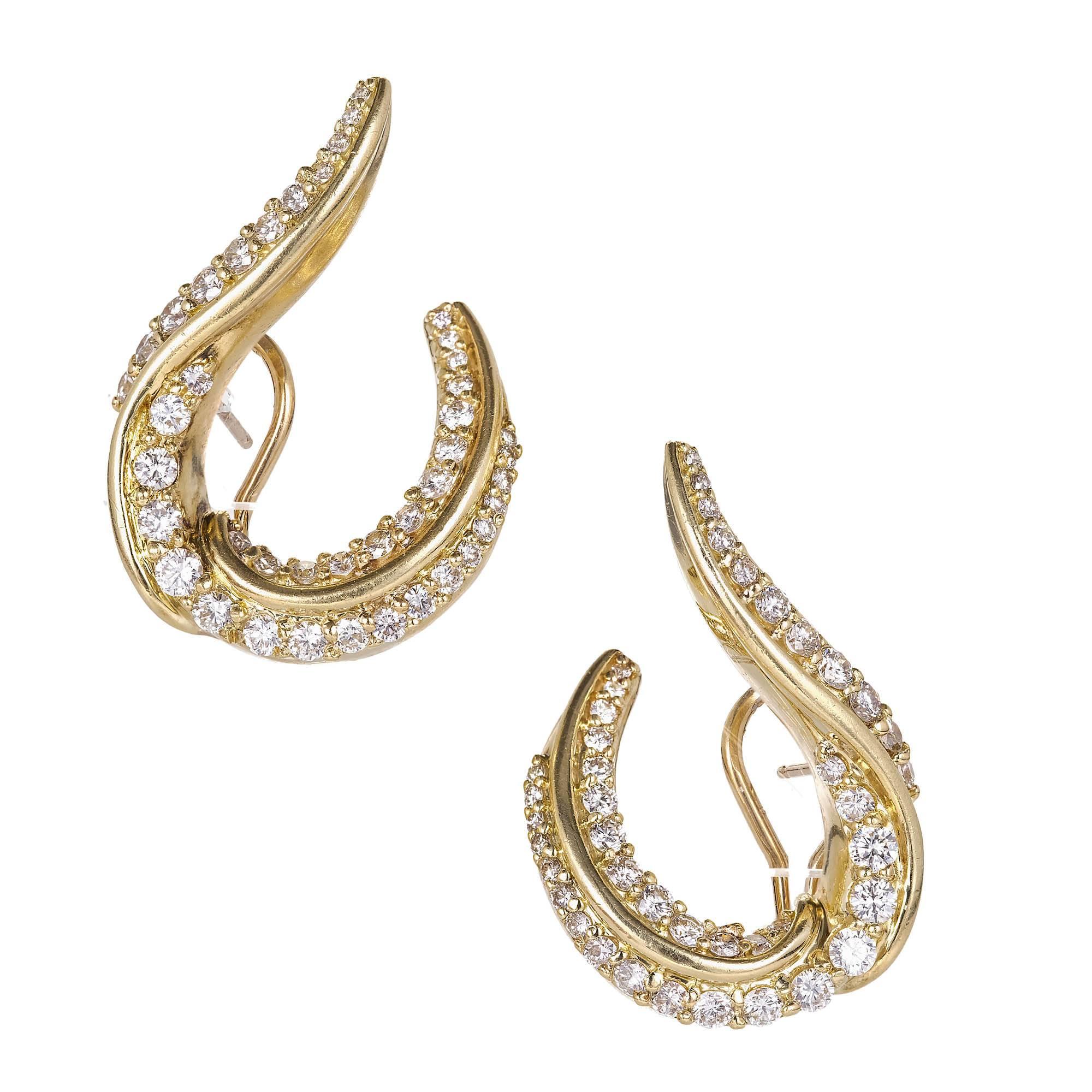 Original diamond 18k yellow gold stamped Rotenier Swirl clip post earrings, stamped with a registration number. Set with E-F VS round cut diamonds.

78 round diamonds approx. total weight 2.50cts, F, VS.
Stamped 18k 200219GA. Routier.
21.3 grams.
1
