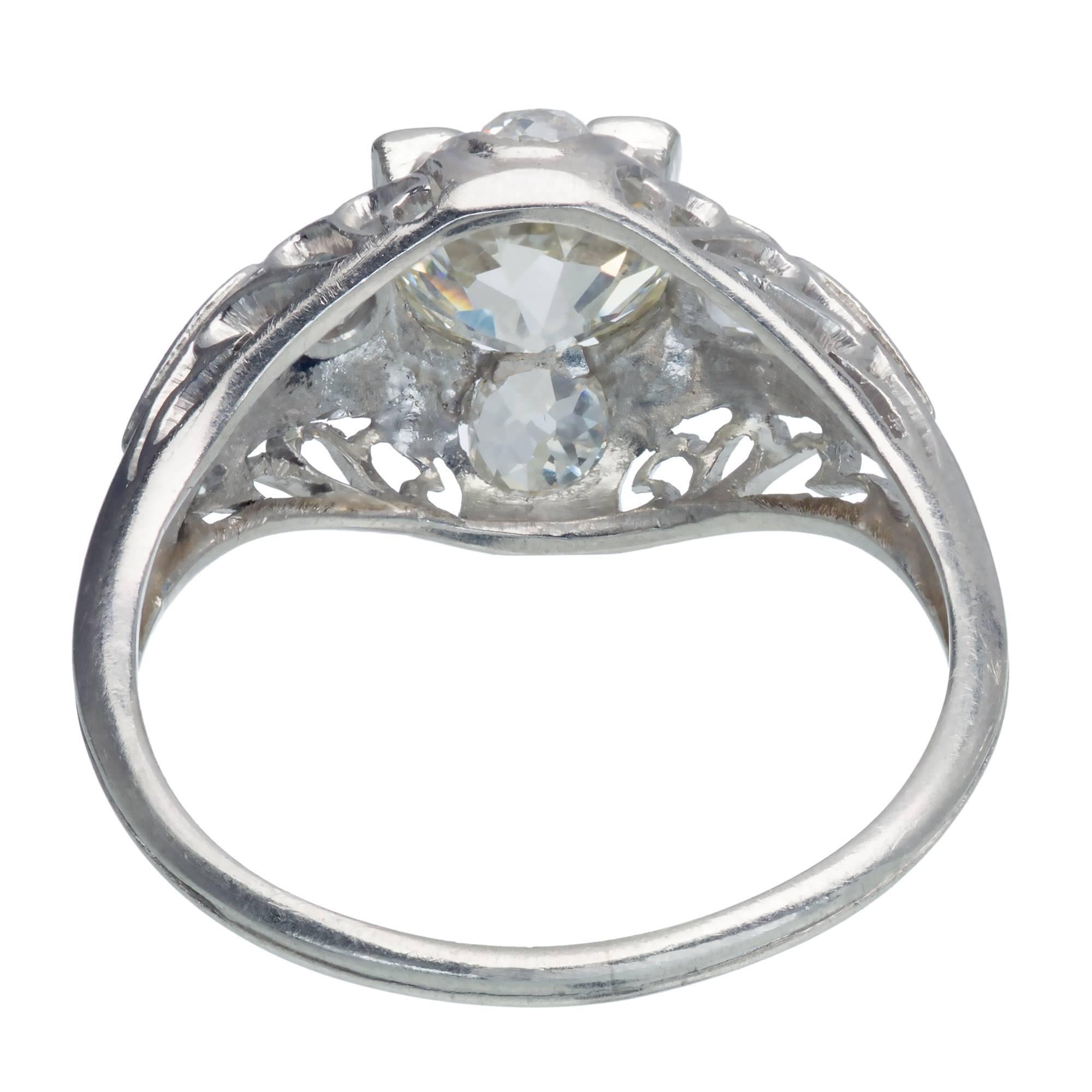 Handmade antique Platinum filigree engagement ring, circa 1870s set with wonderful old old European and mine cut Diamonds in a domed pierced engagement setting.

1 old European cut Diamond, approx. total weight 1.40cts, I – J, VS2, EGL certificate #