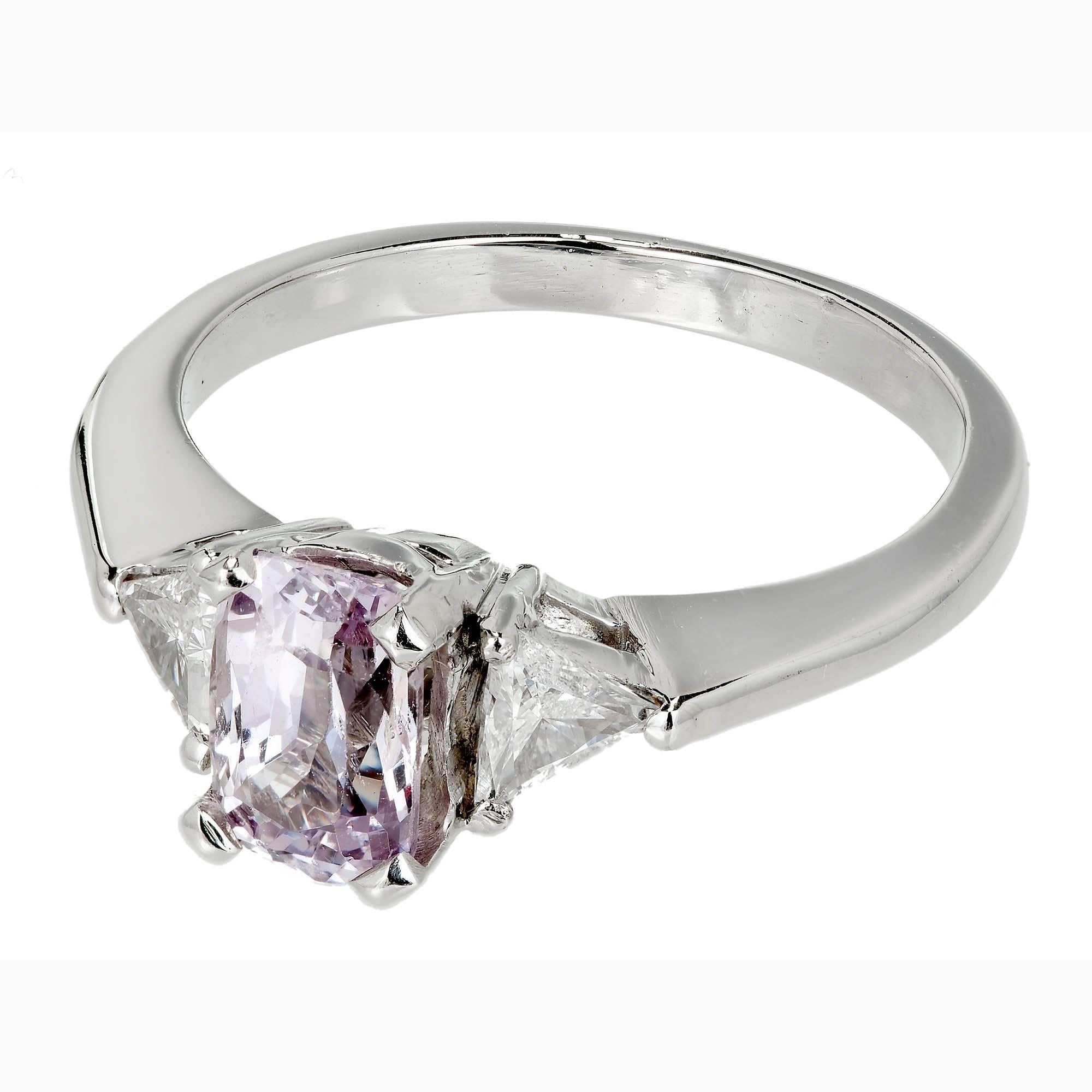 Very light purple natural no heat Spinel with no enhancements in its original 1940-1950 handmade Platinum three-stone setting with side diamonds. 

1 cushion natural very light purple Spinel, approx. total weight 1.20cts, SI, 7.29 x 4.90 x 3.93mm,
