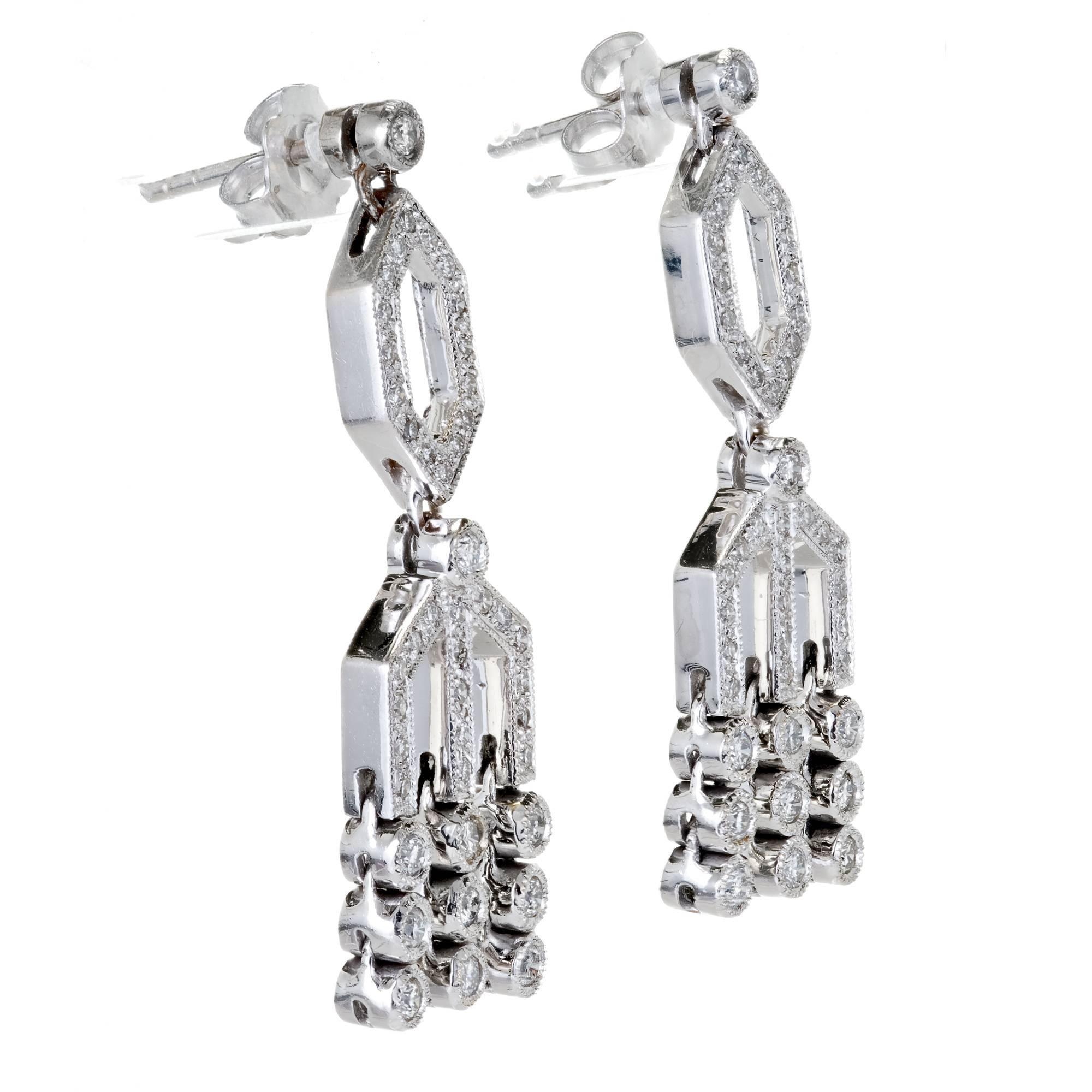 Geometric dangle diamond earrings in 18k white gold.  circa 1950-1960. 

18k White gold
88 full cut diamonds, approx. total weight 1.00cts, H, VS-SI
Top to bottom: 34.78mm or 1.37 inches
Width: 10.5mm or .41 inch
Depth: 3mm
7.6 grams
Tested: