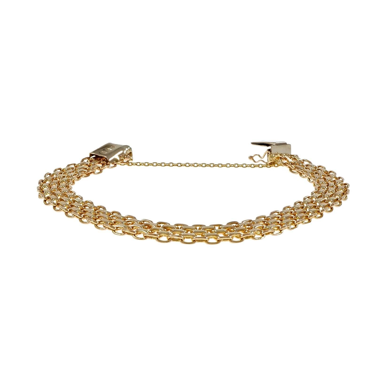1960’s Italian Bismark link 14k yellow gold bracelet. Hidden built in catch with added safety chain.

14k yellow gold
18.2 grams
Tested and stamped: 14k
Hallmark: Italy
Length: 8.5 inches
Width: 9.47mm – Depth: 2.0mm
