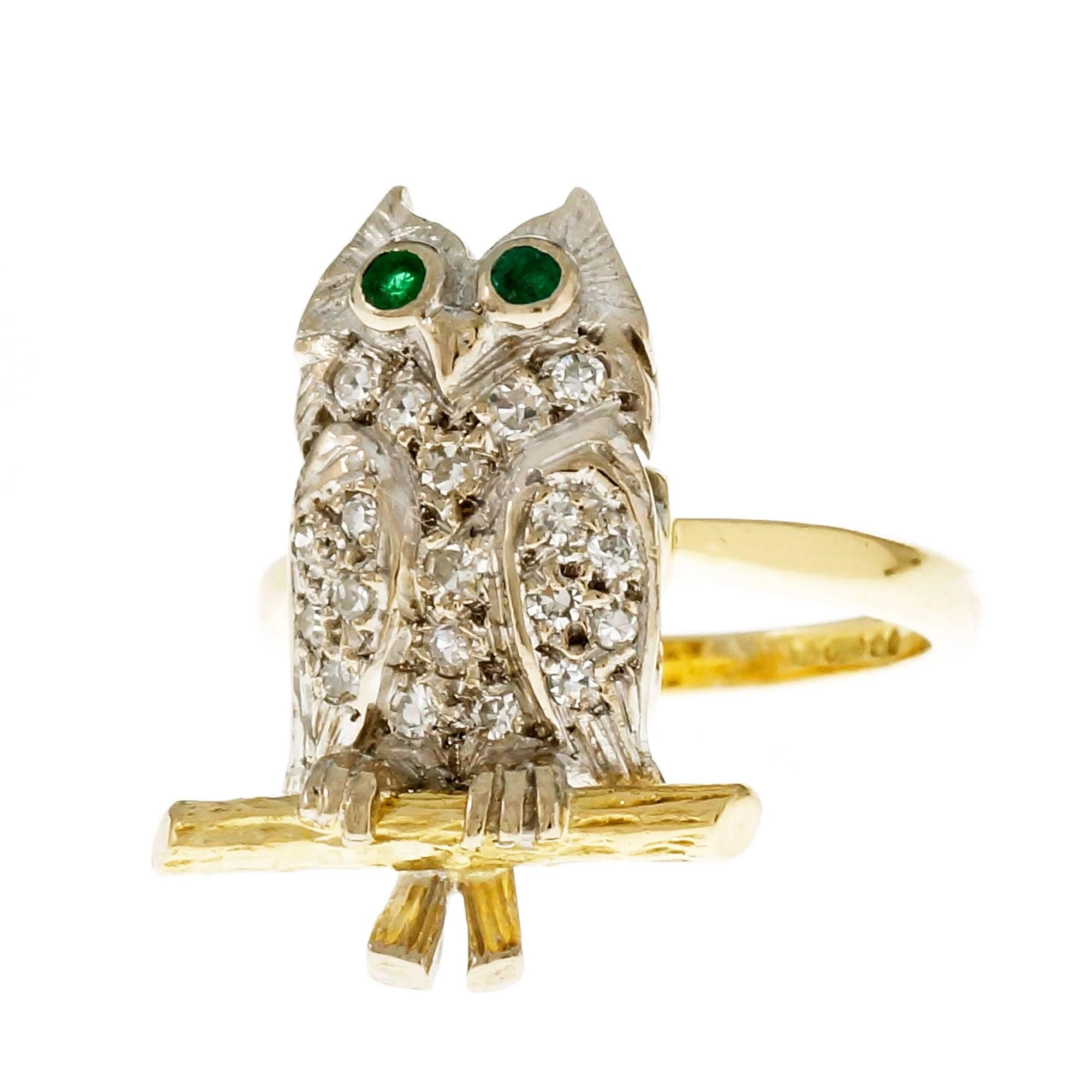 18k yellow and white gold Owl ring with Diamond pave body and genuine Emerald eyes. Signed JHL.

19 round single cut Diamonds, approx. total weight .25cts, H, VS – SI
2 round green Emeralds, approx. total weight .08cts, 2mm
18k yellow and white