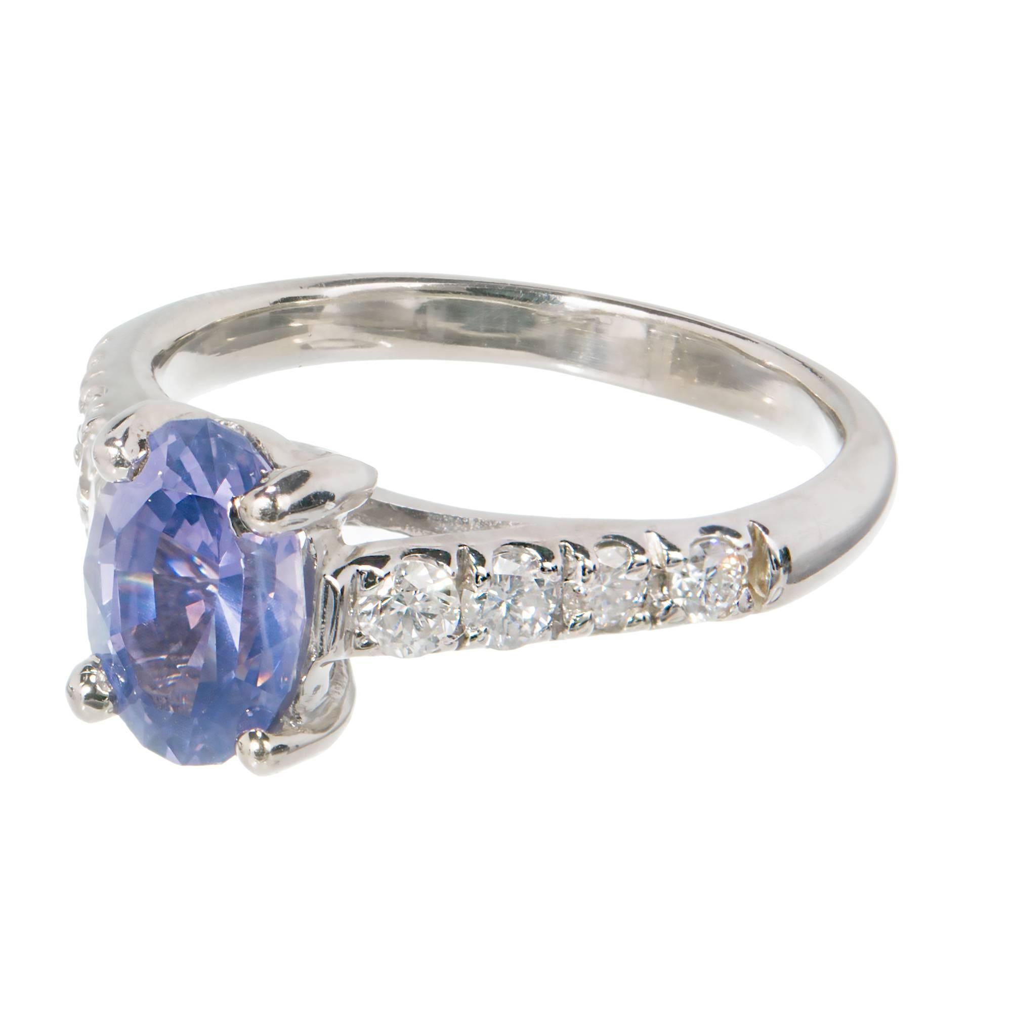 Peter Suchy Natural no heat AGL certified bluish violet 1.60ct oval Sapphire engagement ring, in a solid Platinum ring with crossed prong top and fine diamond accents.

1 AGL certified natural no heat and no enhancements medium bluish violet super