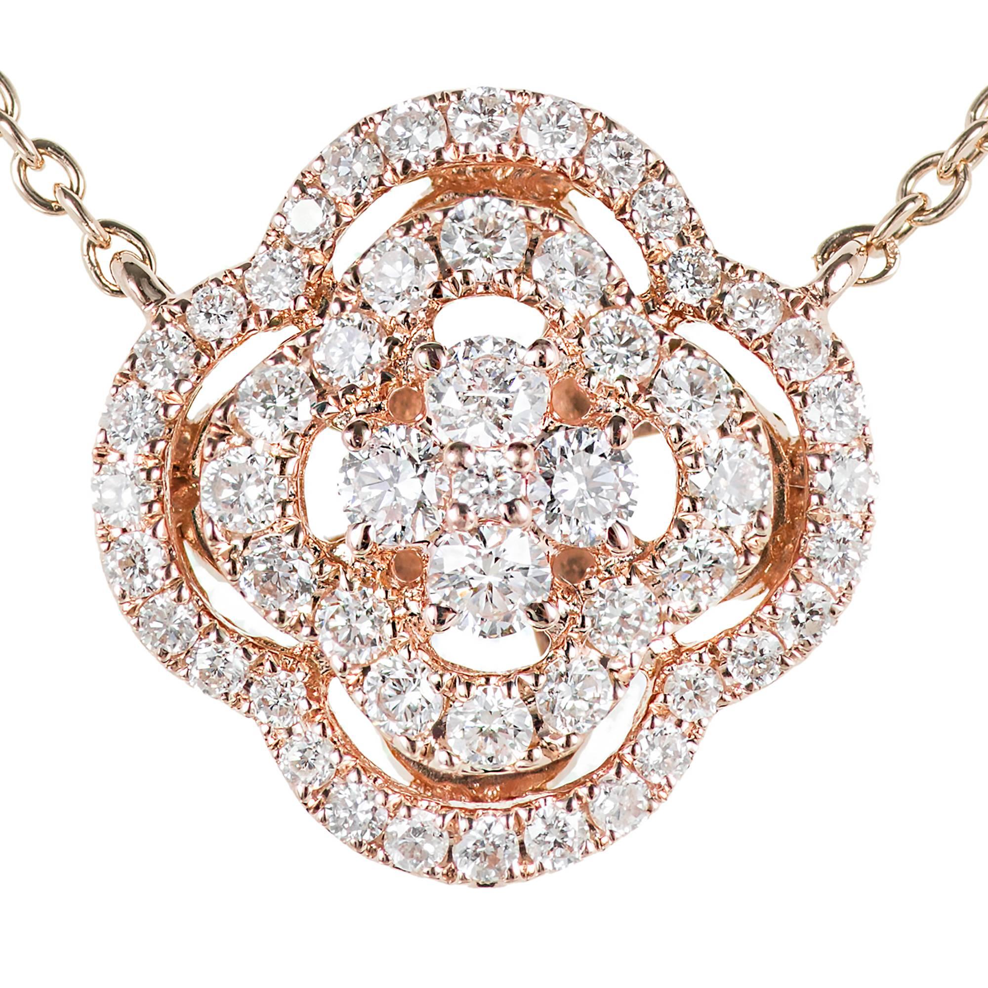 Diamond pendant necklace. 67 round diamonds set in three 14k rose gold cluster settings, linked together by a 16 inch 14k rose gold chain. 

67 round full cut Diamonds, approx. total weight .63cts, G, SI1
14k rose gold
Tested: 14k
Stamped: 585
3.4