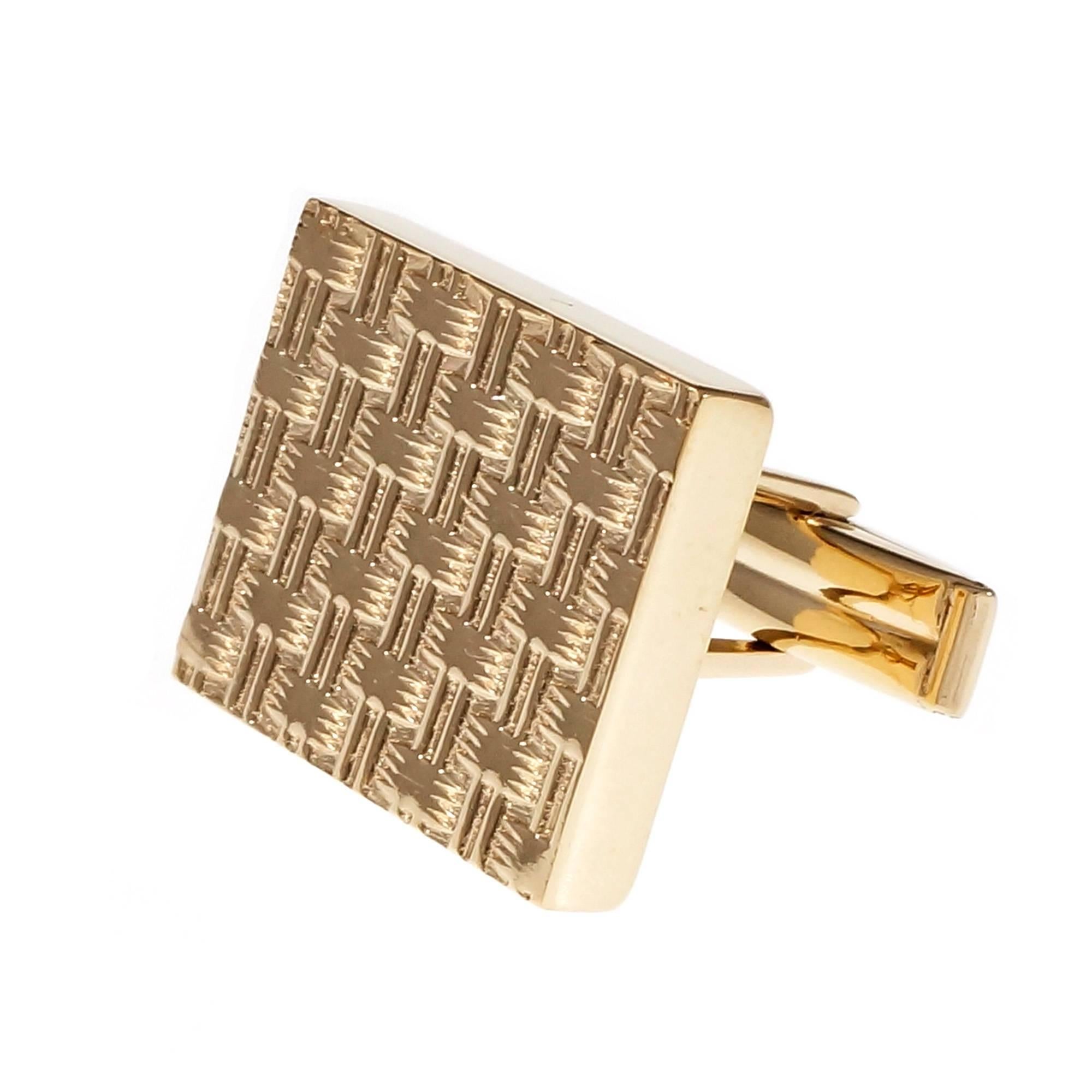 Braided design rectangular 1960’s cufflinks 14k yellow gold.

14k yellow gold
14.4 grams
Tested and stamped: 14k
Hallmark: J
Top to bottom: 17.76mm or .70 inch
Width: 21.73mm or .85 inch
Depth: 3.74mm

