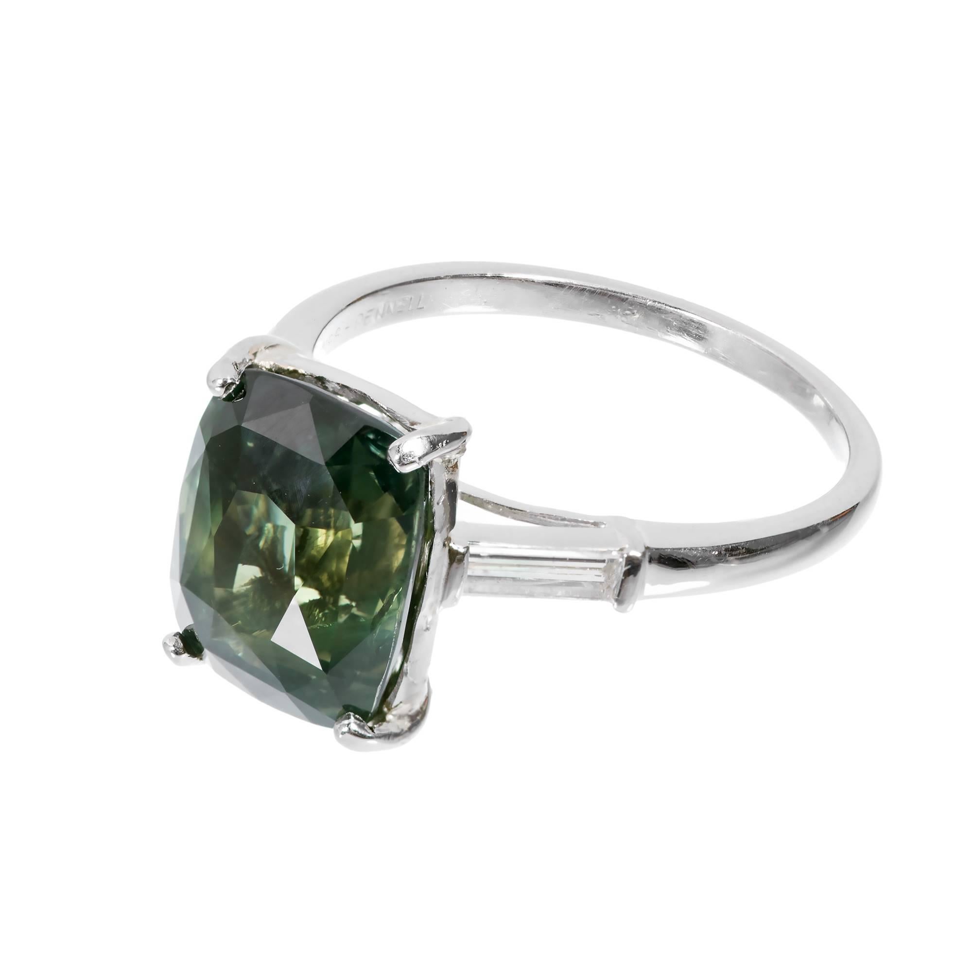 Ross Pennell Art Deco platinum cushion green sapphire diamond three-stone platinum engagement ring. 

1 Cushion Green SI Sapphire natural corundum approximately 5.98 carats. GIA 2483072141
2 tapered baguette diamonds G VS approximately .28