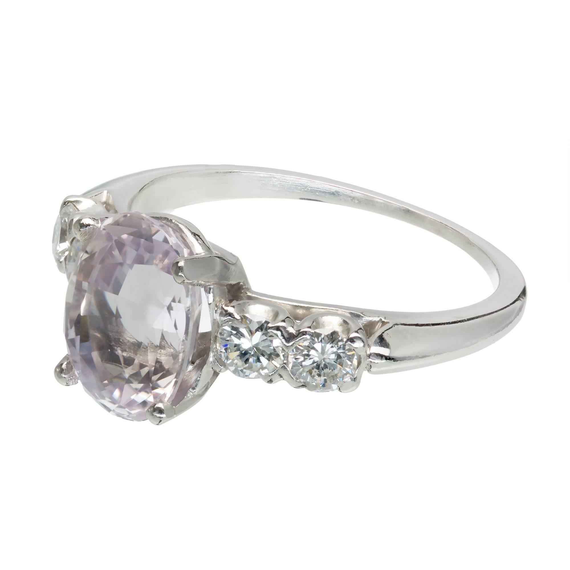 Natural no heat GIA certified oval soft light pink Sapphire engagement ring circa 1940 -1950 with fine white full cut side Diamonds in a Platinum setting.

1 oval light pink sapphire, approx. total weight 3.39cts, MI, GIA certificate # 2175101453
4