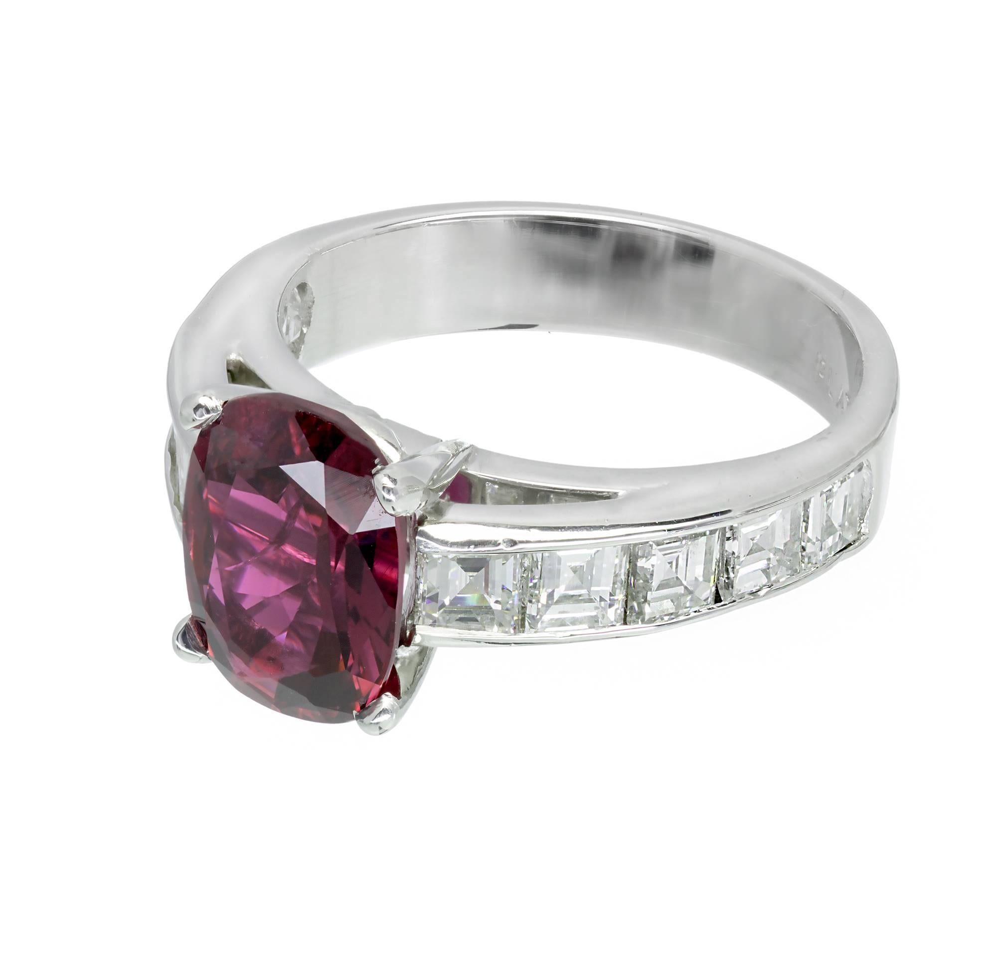 Peter Suchy Designs handmade Platinum engagement ring with square step cut channel set Diamonds and an elongated cushion cut natural no heat center Ruby. GIA certified as natural no heat no enhancements. Bright purplish red color. 

1 cushion