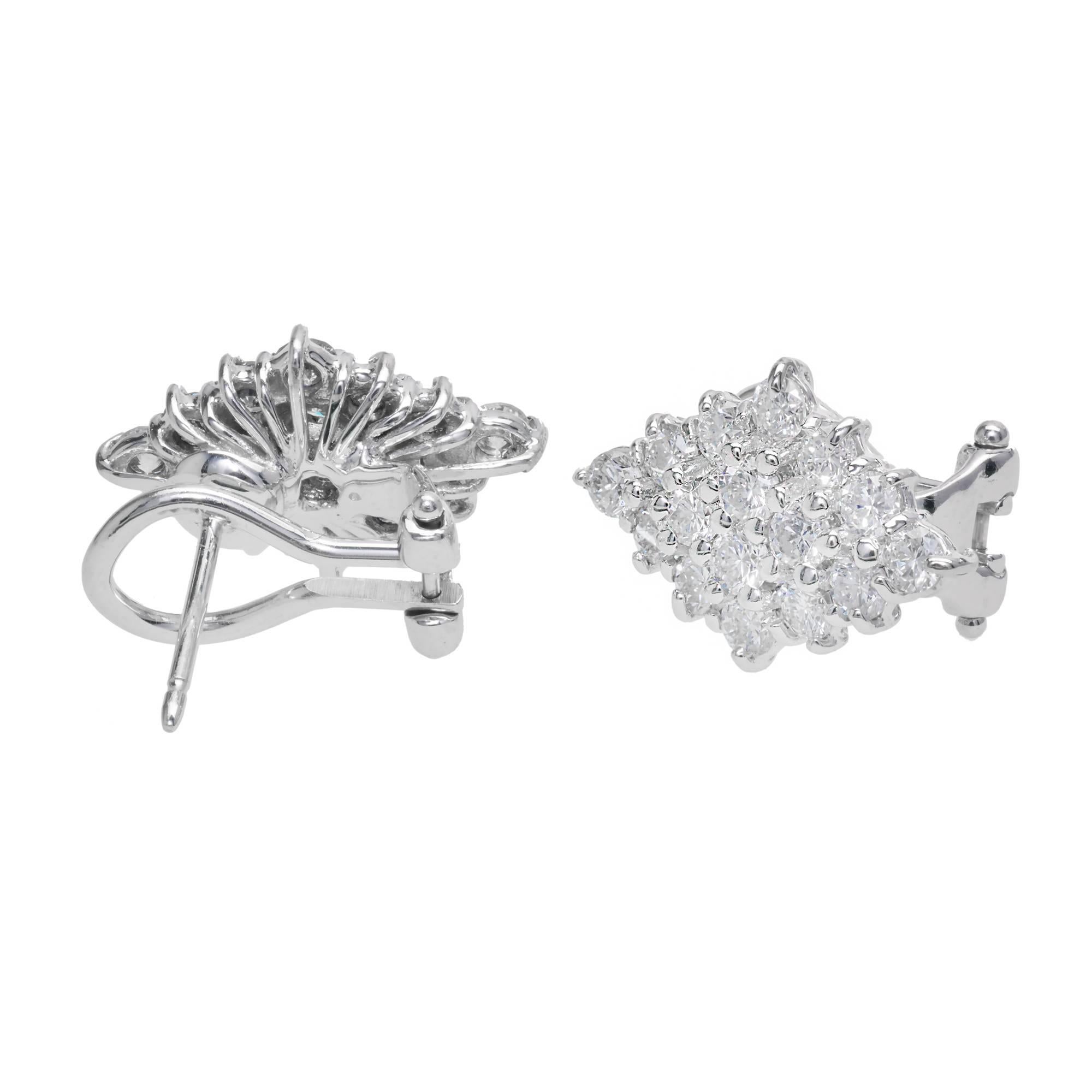 Handmade wire Marquise shaped clip post earrings with bright white sparkly Diamonds. 

32 round Diamonds, approx. total weight 2.00cts, F, SI1 – SI2
14k white gold
Tested: 14k
Stamped: 585
Hallmark: *
7.4 grams
Top to bottom: 18.22mm or .72