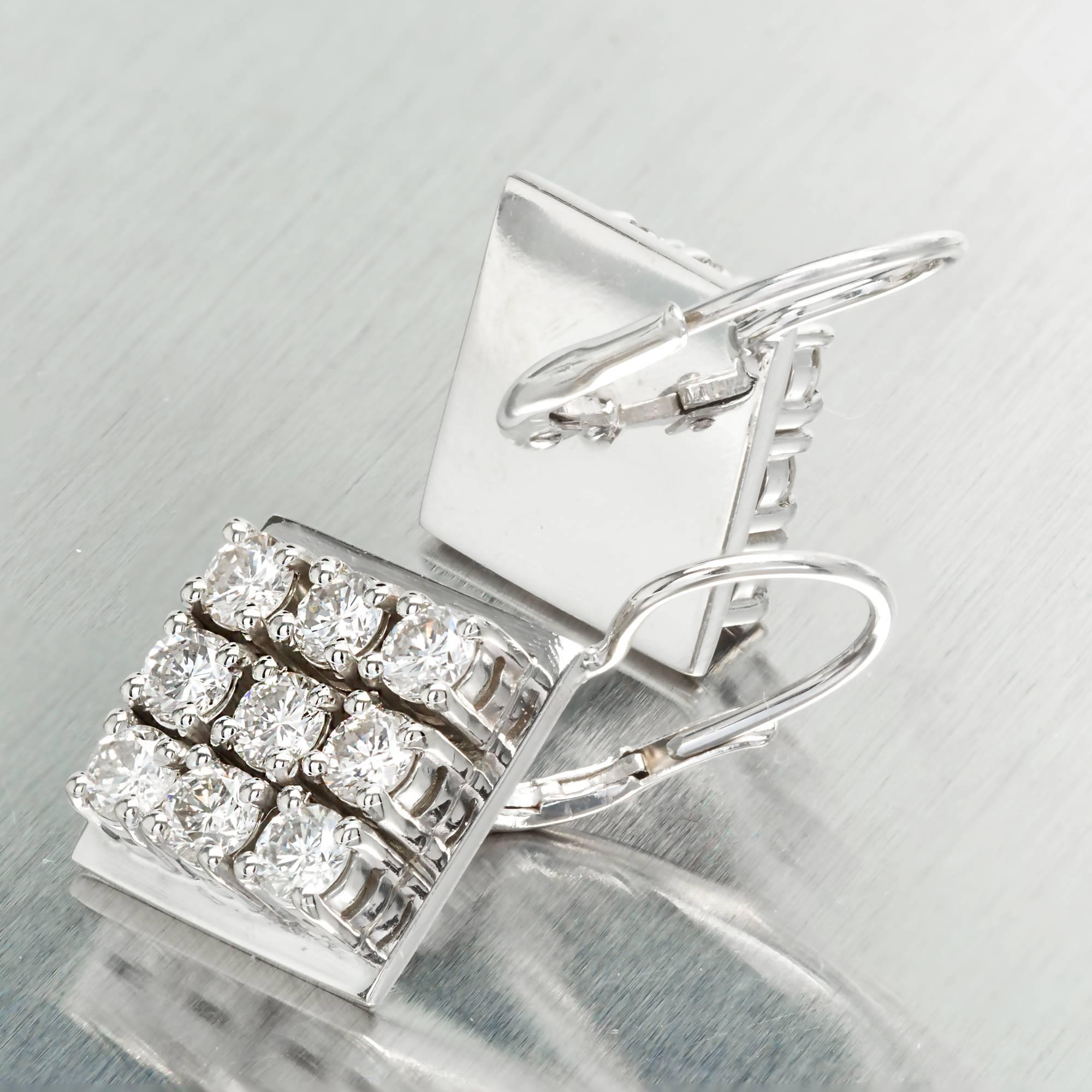 Sparkly diamond square cluster earrings with secure Euro wire tops. Each frame is set with 16 round full cut diamonds in square clusters with a total weight of 2.70cts. Circa 1960-1970. The white gold setting enhances the brilliance of the diamonds,