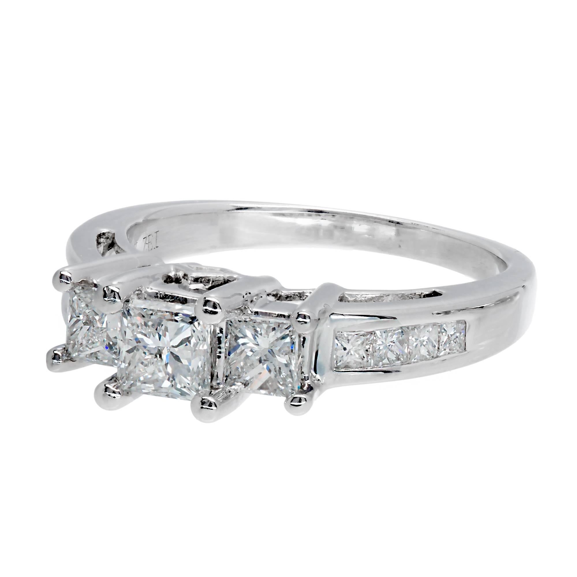 Princess cut Diamond 3 stone engagement ring with Princess cut accent Diamonds. 

14k white gold
1 Princess cut Diamond, approx. total weight .59cts, F – G, SI2, EGL certificate # US313707601D
2 Princess cut Diamonds, approx. total weight .50cts, G