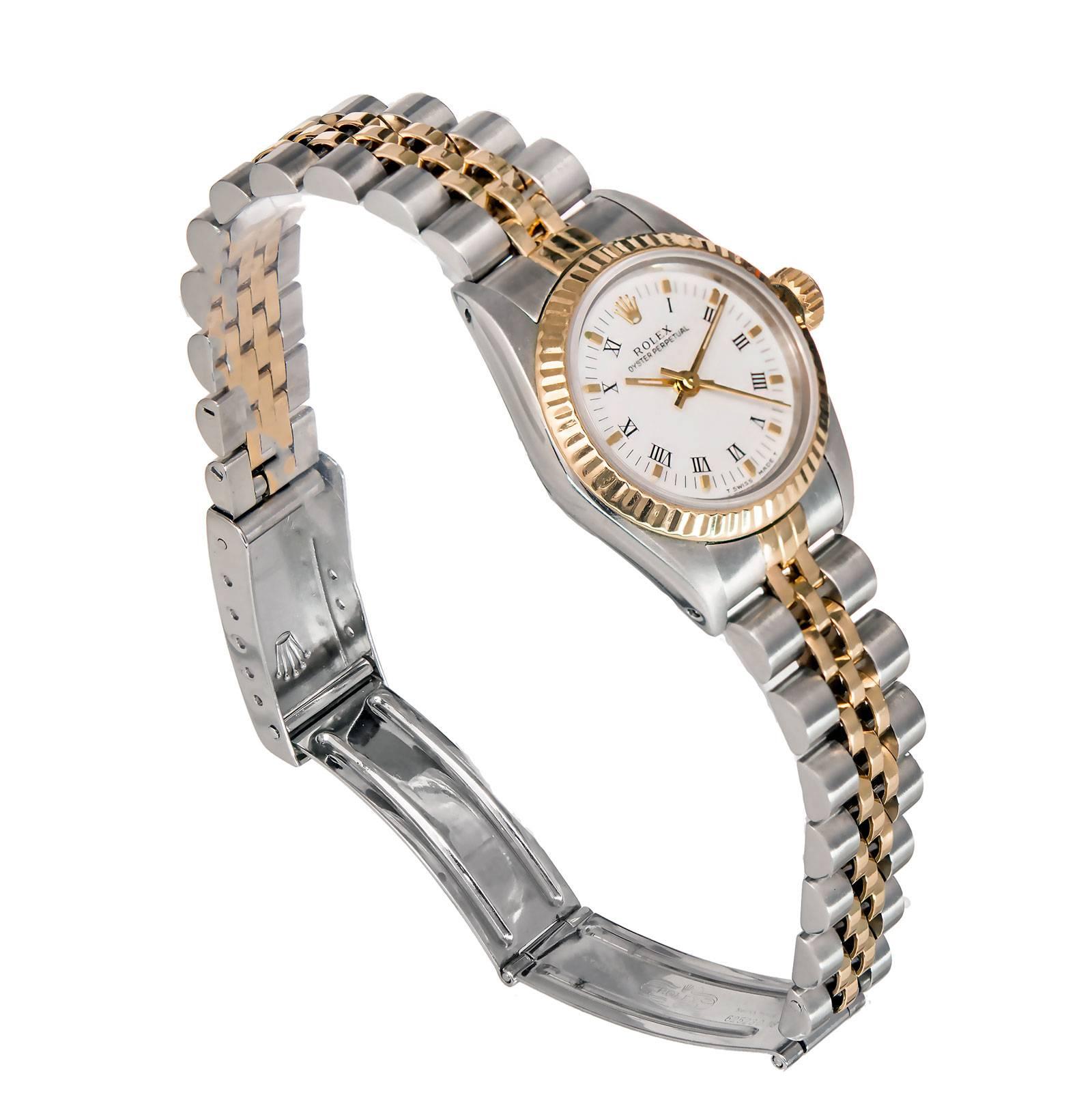 Rolex ladies 18k yellow gold and stainless steel. All original wrist watch. Model 67193 Oyster Perpetual, no date. Jubilee band, original white dial with raised markers. Circa 1987.

18k yellow gold and stainless steel
Band length: 6.5 inches –