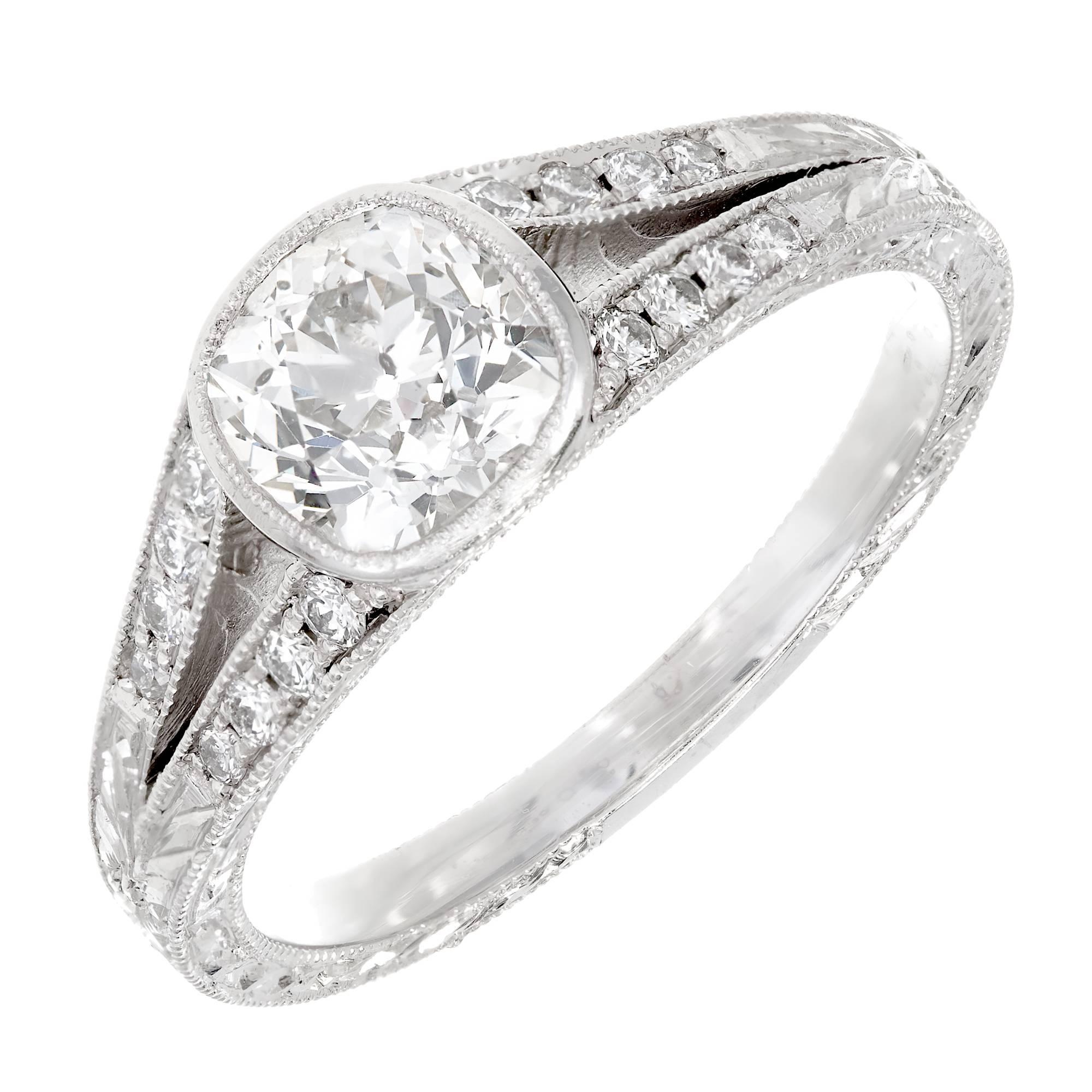 Peter Suchy cushion brilliant cut diamond engagement ring. Diamond split shank with hand engraving and bead setting in platinum. 

1 antique cushion brilliant cut diamond, approx. total weight 1.09cts, G-H, SI3, EGL certificate #US69606401D
16 round