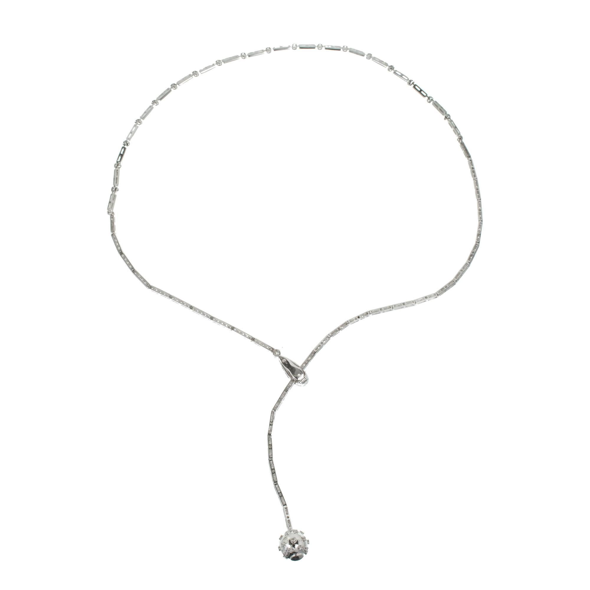 Adjustable 18k white gold diamond drop necklace. Secure pave catch allows wear from 16 to 19 inches.

Approx. 120 full cut diamonds, approx. total weight 1.50cts, G-H, VS1 - SI1
18k white gold
Tested: 18k
Stamped: 750
18.1 grams
Ball diameter: