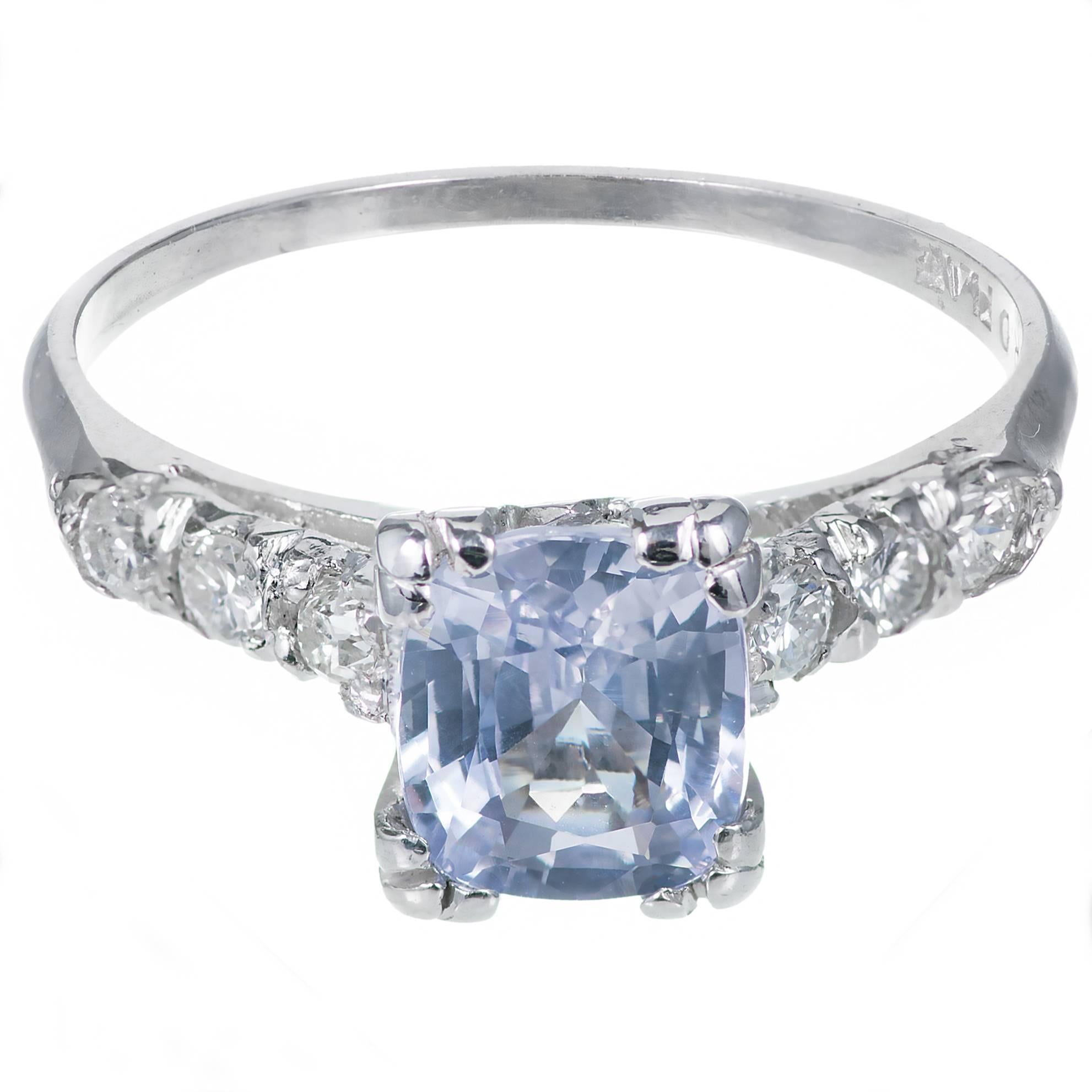 Natural GIA certified light violet Sapphire Platinum engagement ring, circa 1930 – 1940. Bright full cut side Diamonds. 

Platinum
1 cushion very light violet Sapphire, approx. total weight 1.45cts, VS, GIA certificate #5182148399
6 round full cut