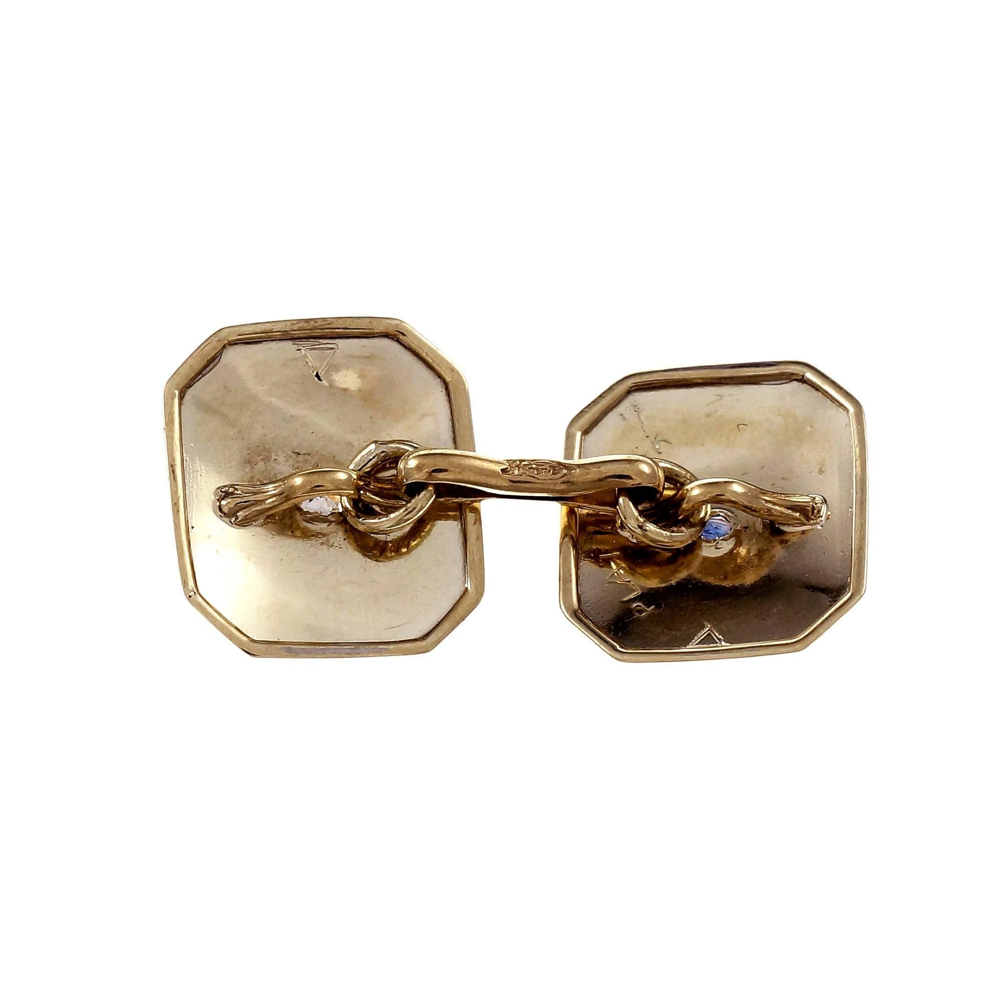 Vintage Platinum 14k yellow gold double sided 1930 cufflinks with Sapphires and old European cut Diamonds.

2 round blue sapphires, approx. total weight .12cts, MI
2 round old European cut Diamonds, approx. total weight .07cts, H, SI
14k yellow gold