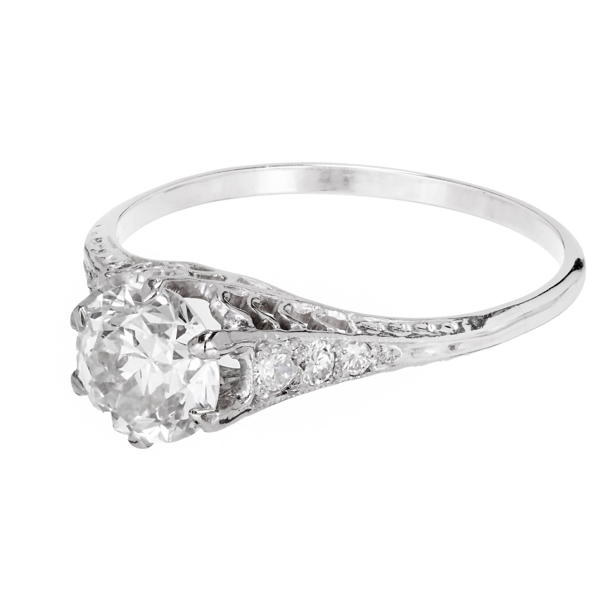 All original Art Deco Platinum filigree engagement ring with an old European cut center Diamond. GIA certified L color and VS1
clarity. Face up color is I to J because of the cutting and ring.

1 old European cut Diamond, approx. total weight