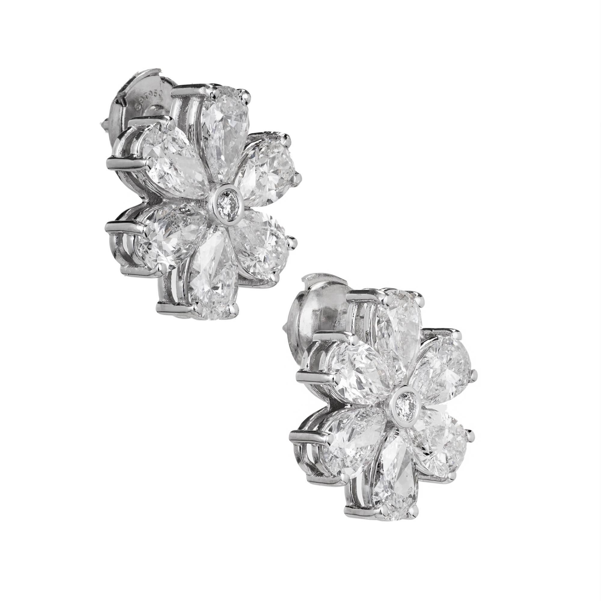 Peter Suchy Jewelers pear shaped Diamond cluster earrings in handmade Platinum settings. Platinum posts and La Pousette safety backs.

2 round Diamonds, approx. total weight .04cts
12 pear Diamonds, approx. total weight 6.70cts, H – I, SI1 – I1
950