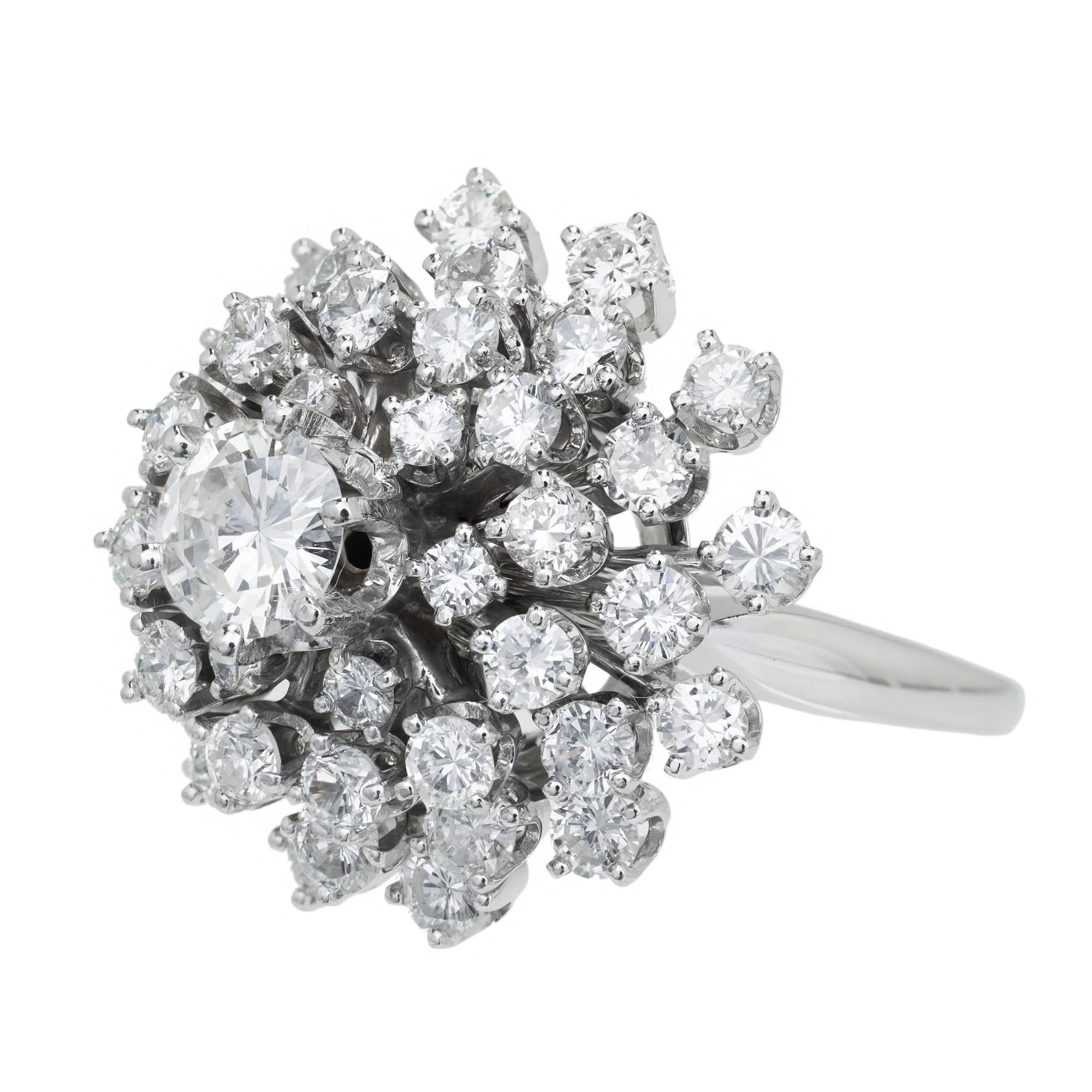 Spectacular vintage 1960's raised domed diamond cluster cocktail ring. EGL certified .80cts center diamond with 43 bright round cut diamonds in a tiered 14k white gold cluster setting.

1 transitional cut Diamond, approx. total weight .80cts, F – G,