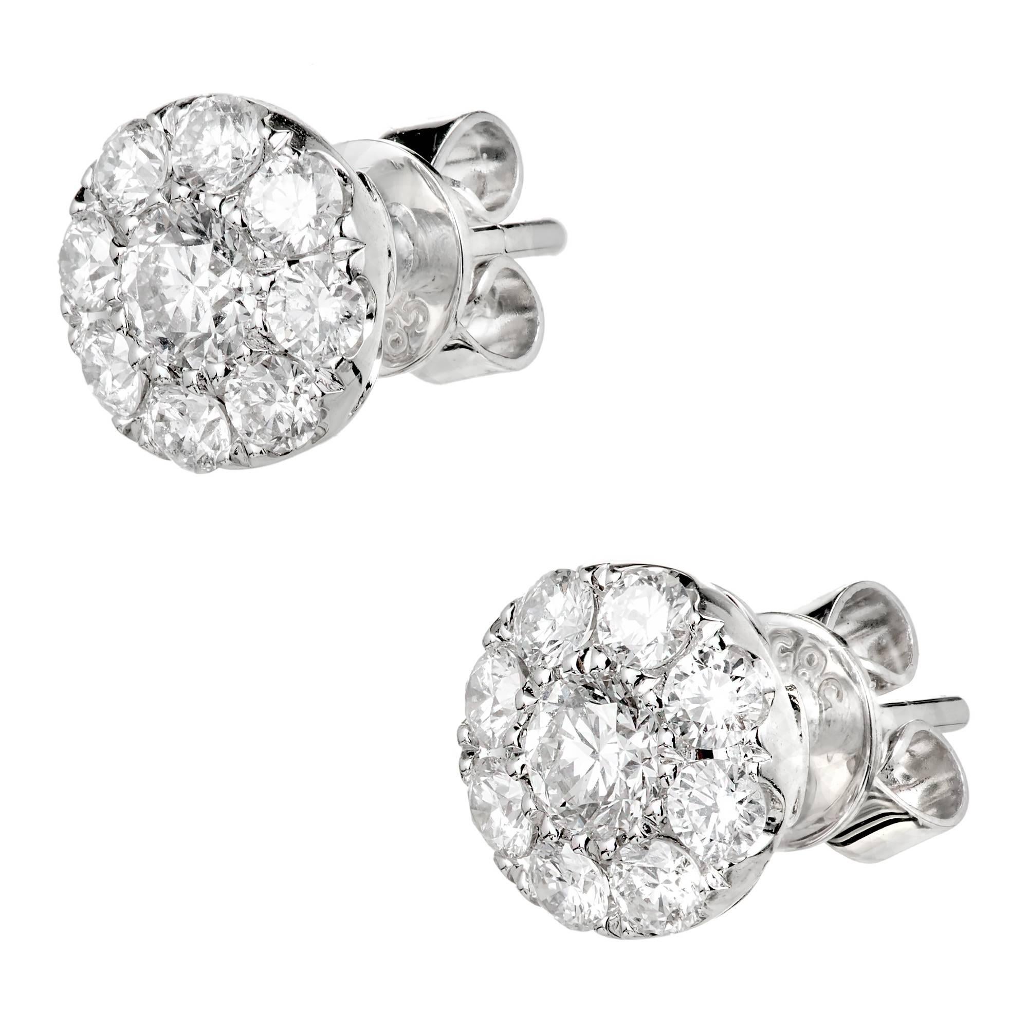Round Diamond cluster earrings with bright white brilliant cut Diamonds, in 14k white gold.

2 round full cut Diamonds, approx. total weight .33cts, G, VS – SI
16 round full cut Diamonds, approx. total weight .90cts, G, VS – SI
14k white gold
1.9