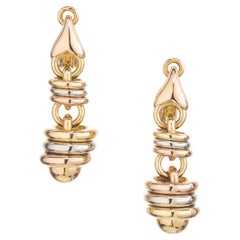 Pendientes de clip con diseño en espiral en capas de oro tricolor de 18k