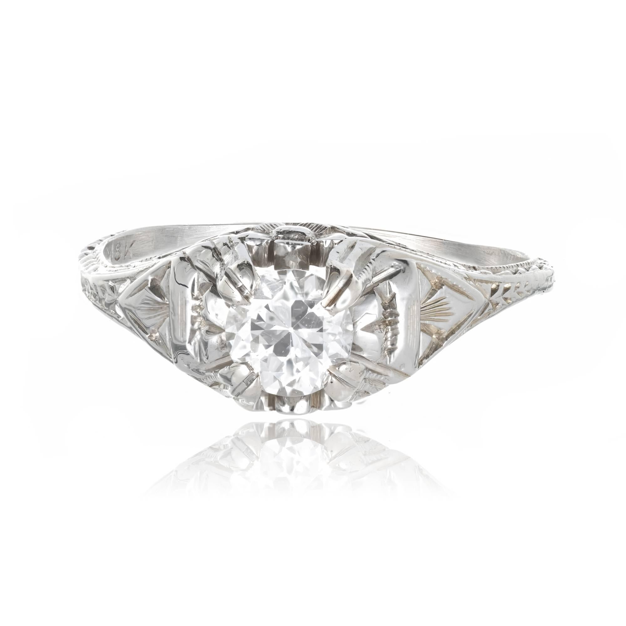 1930-1940 filigree transitional cut diamond engagement ring. Raised hand carved and filigree in its original 18k white gold setting.

1 transitional cut diamond, approx. total weight .40cts E - F, SI1, EGL certificate #US68998801D
Size 6 and
