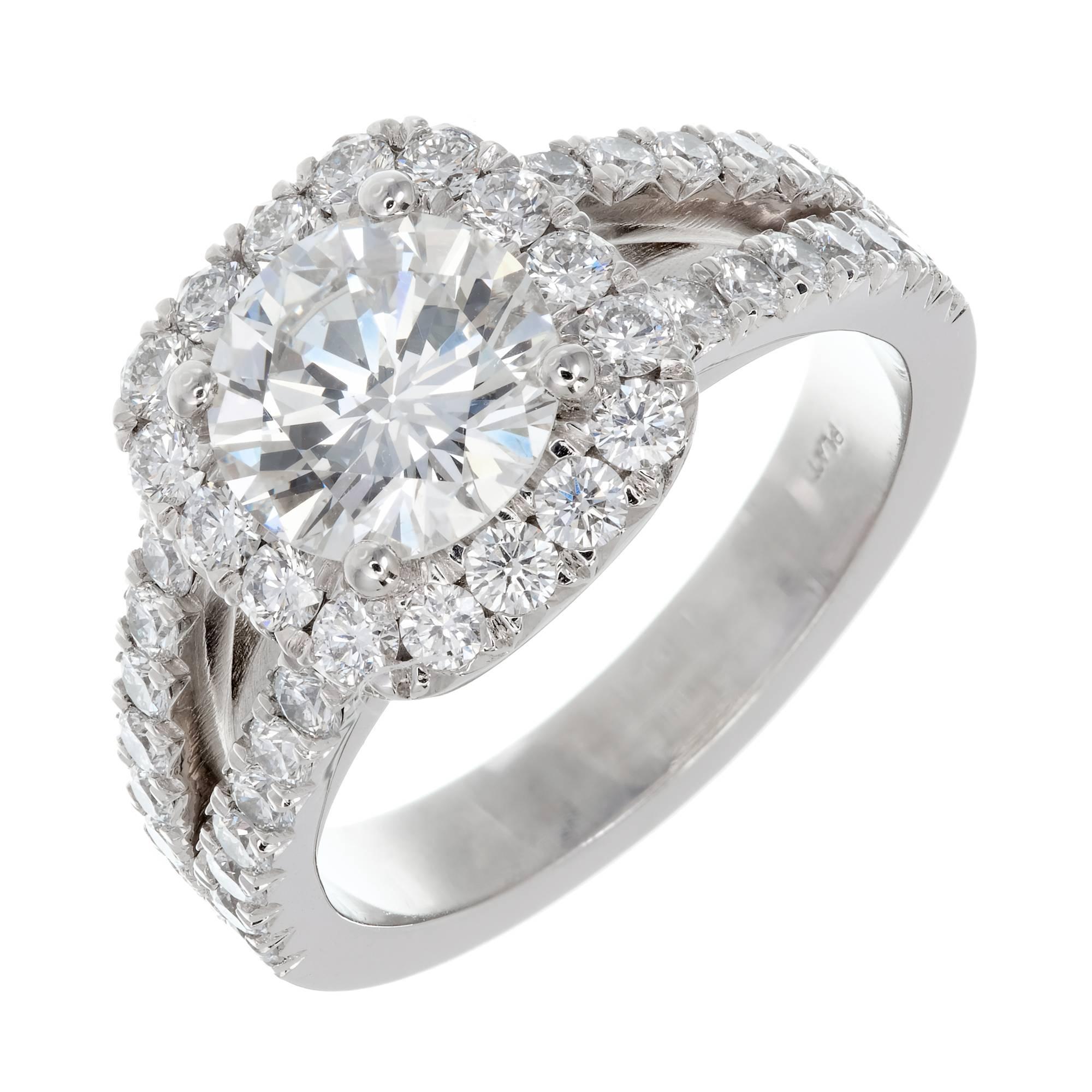 Peter Suchy custom cushion halo split shank Diamond engagement ring with Ideal cut Diamonds that are bright white and brilliant surrounding a traditional Ideal cut round center Diamond. The ring is brand new from the Peter Suchy Workshop designed