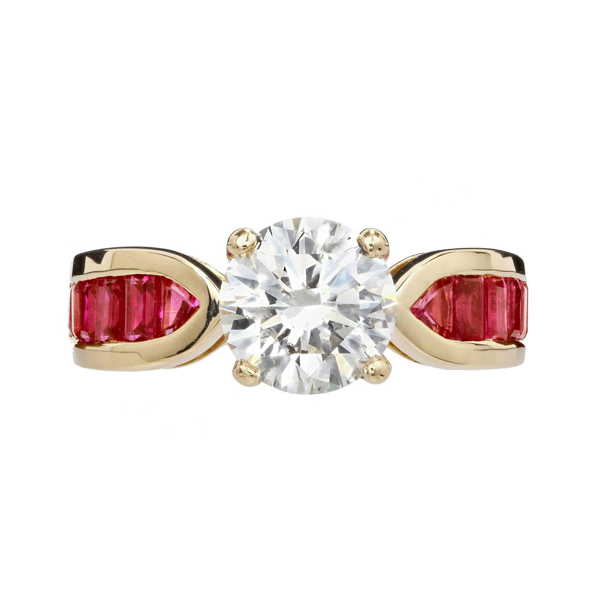 Peter Suchy 18k yellow gold channel set natural no heat Ruby and diamond engagement ring. Center diamond is GIA certified 1.59ct, L color, SI1 clarity and medium blue florescence. The Diamond faces up white because of the excellent cutting and