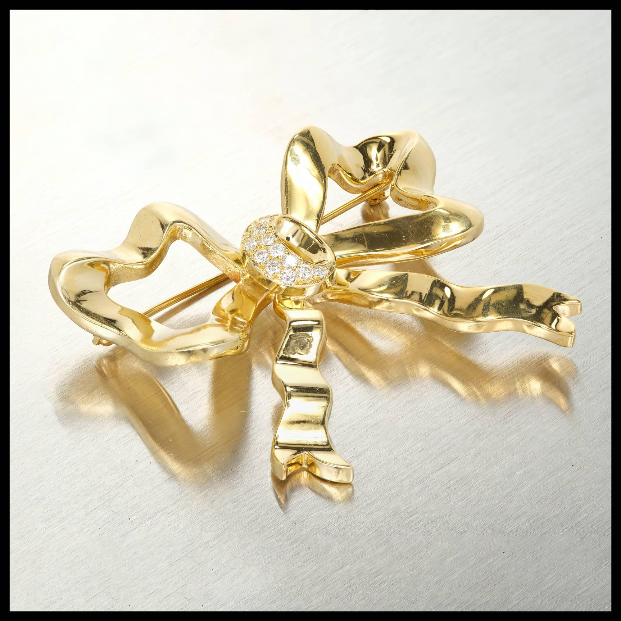 Italian designer Cellino 18k yellow gold bow pin circa 1940s with bright white full cut Diamonds.

11 round full cut Diamonds, approx. total weight .20cts, F – G, VS
18k yellow gold
Tested and stamped: 18k
Hallmark: Cellino
Top to bottom: 42.86mm or