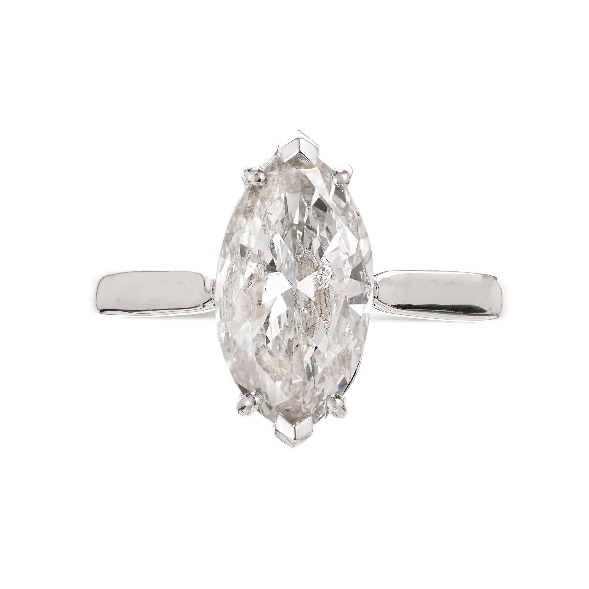Peter Suchy Marquise Platinum Diamond solitaire engagement ring. Simple classic 4 prong V top solitaire designed to let a wedding band sit close to the Diamond and allow light through the Diamond.  

1 Marquise Diamond, approx. total weight 3.07cts,