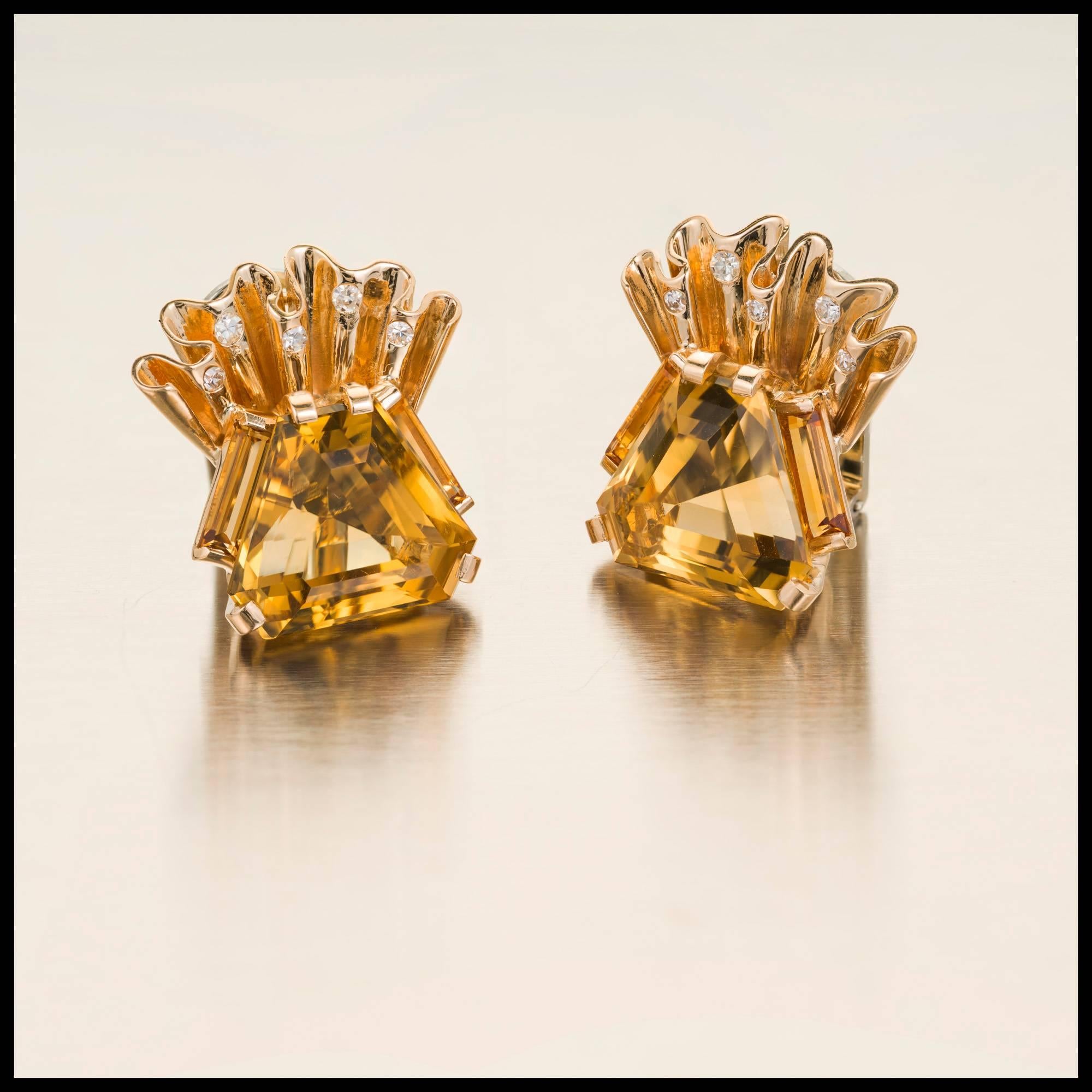 Vintage Retro 1940s hexagon Citrine Diamond earrings with Diamond accents in 14k yellow gold with white gold clips.

2 hexagon yellow Citrines, approx. total weight 8.50cts, 14 x 12mm
10 round Diamonds, approx. total weight .14cts, H, SI1
14k yellow