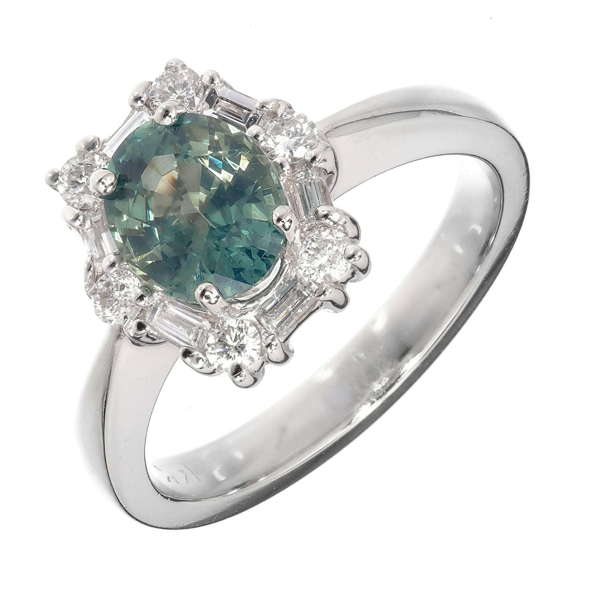 Natural bright clear blue green Sapphire and diamond engagement ring.  GIA certified no heat no enhancements. Original 1960’s 14k white gold halo setting . Stone removed for GIA certification and reset.

1 oval blueish green no heat Sapphire,