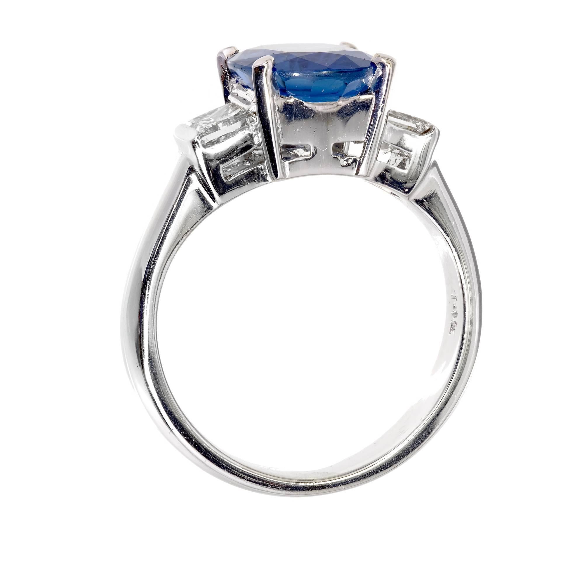 oval diamond with sapphire side stones